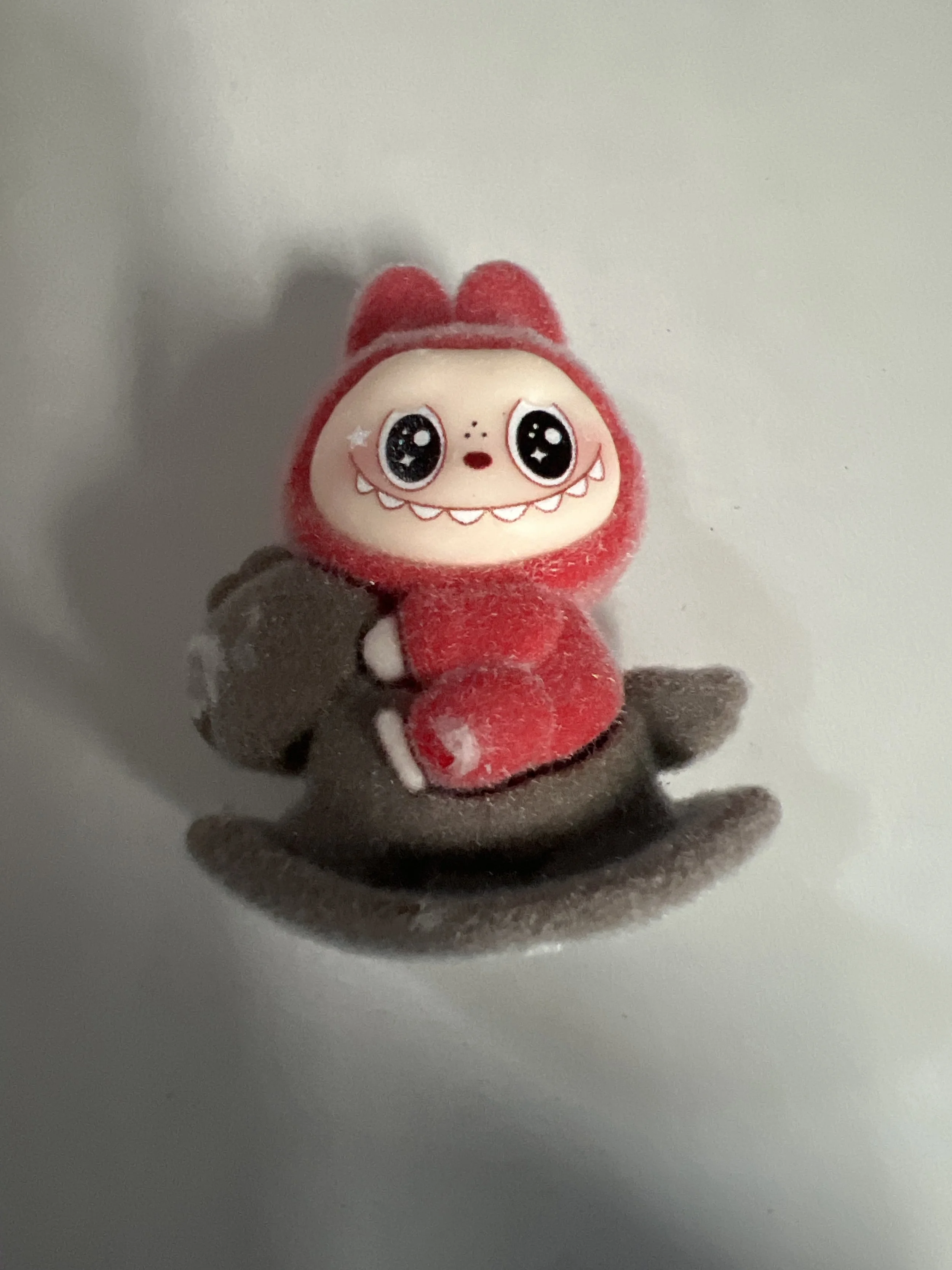 La Bubu Red and Gray on Rocking Horse