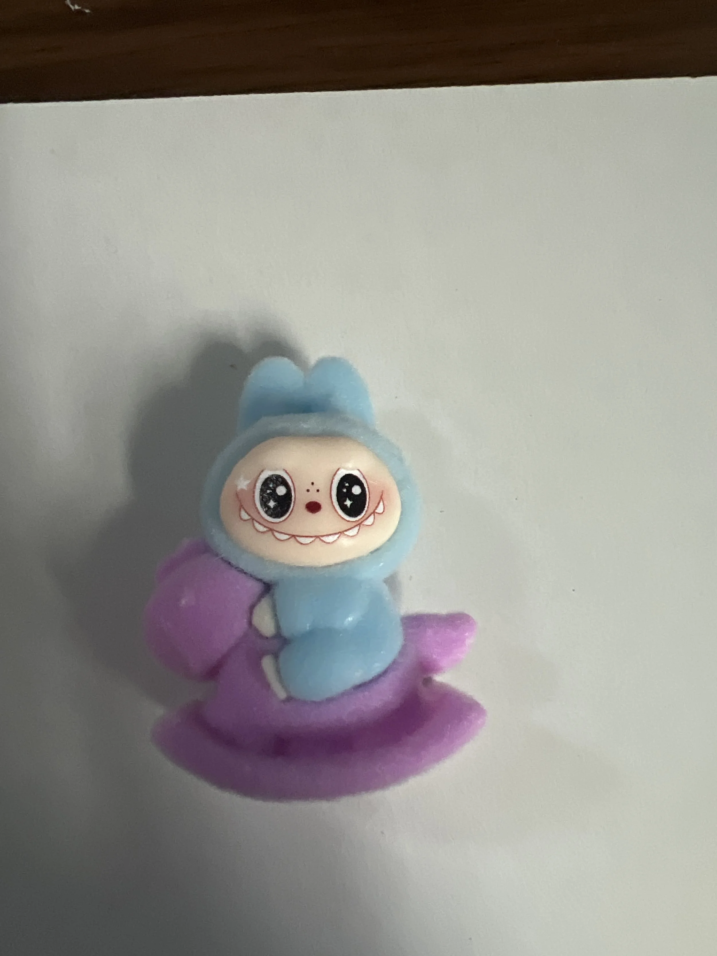 La Bubu Blue and Purple on Rocking Horse