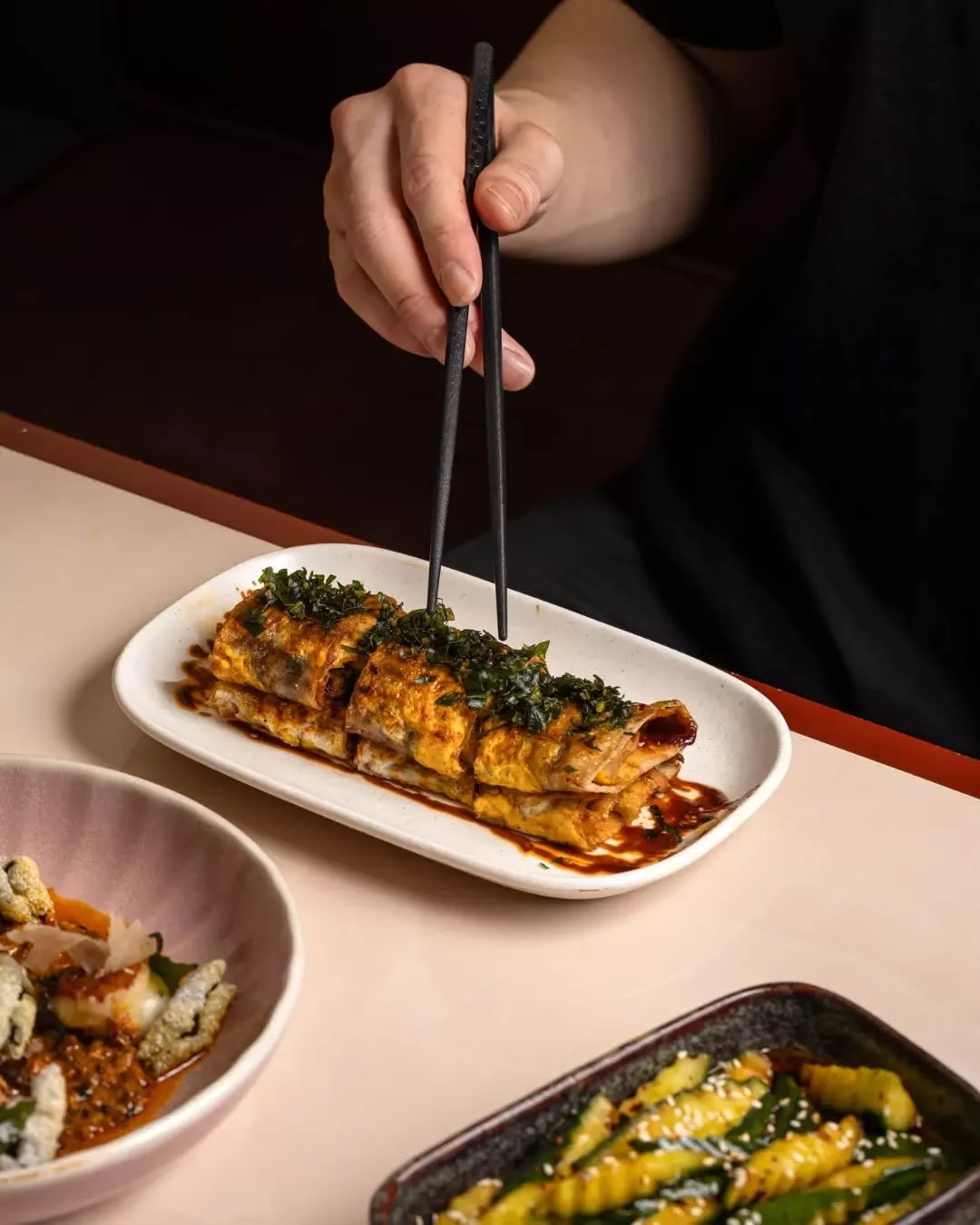 Originating from Heilongjiang&rsquo;s night-stalls, Kao Leng Mian is neither cold nor typical noodles &mdash; our version elevates it with dried tofu, enoki and bold sauces for a modern take you have to try.