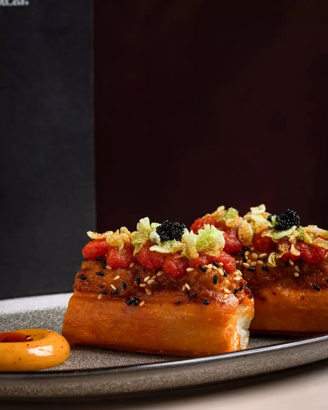 Where spice meets crunch and citrus cuts through the heat. Prawn Toast 油条: Kaffir lime, sundried tomato, green rice, chilli mayo.