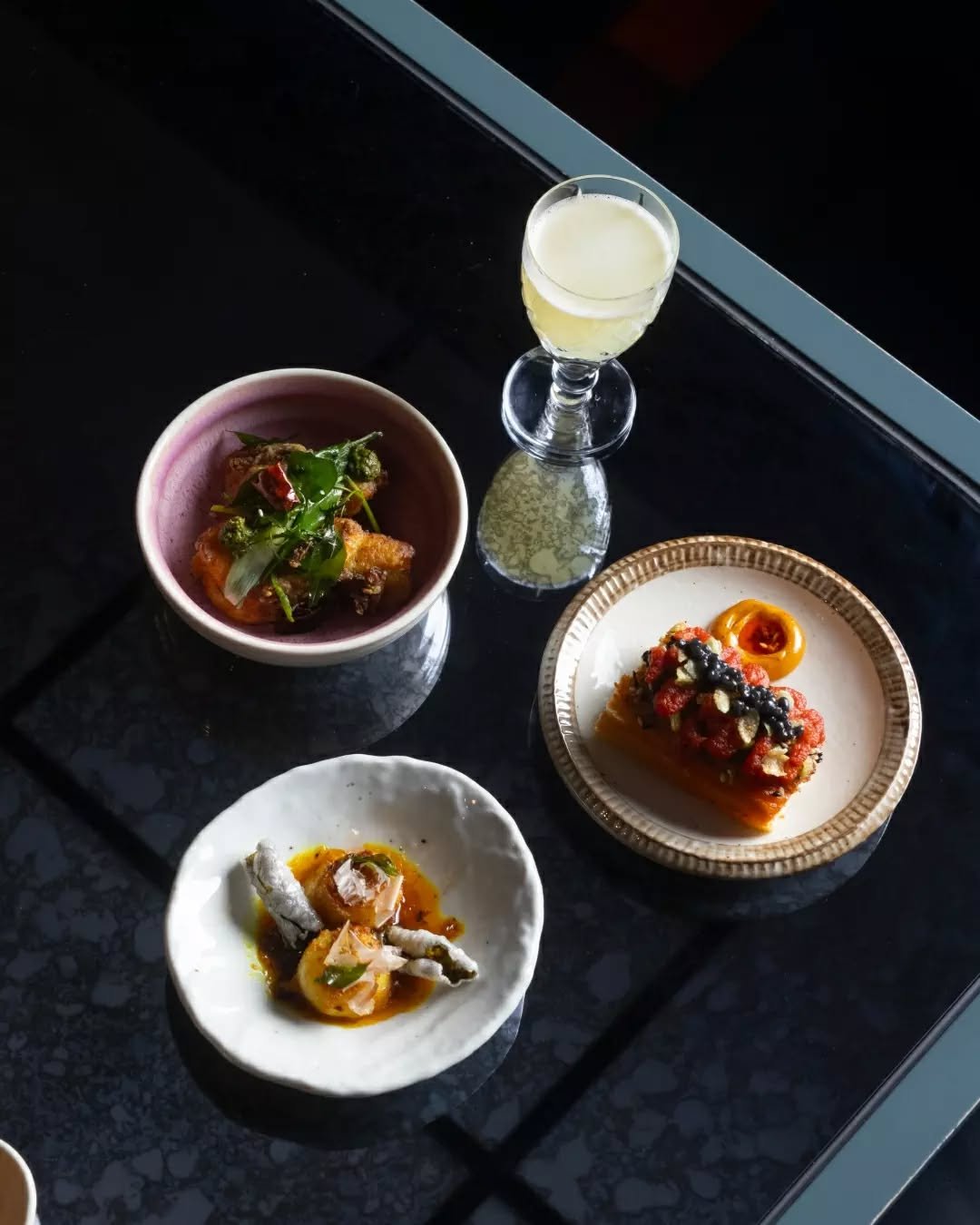 The second course deepens the journey. Dive into SEA.

Scallop with chilli butter, lemongrass, turmeric, XO, seaweed.
Wok snapper with galangal, curry leaves, and nuoc cham.
Prawn toast with kaffir lime and green rice.
Finished with a tropical pour o