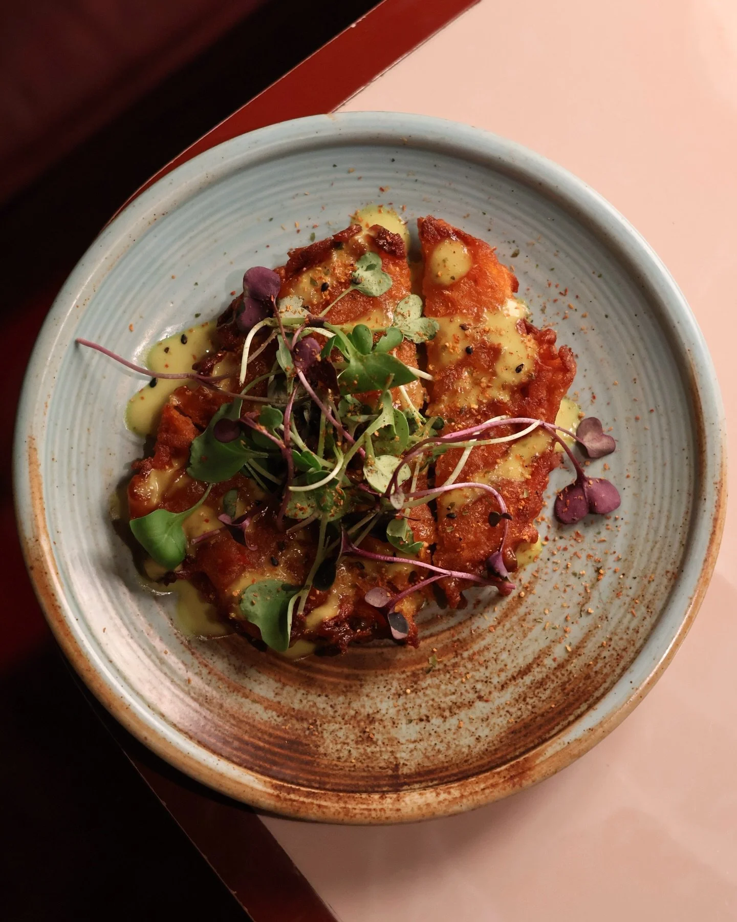 Warm plates arriving at the table, cocktails glowing under dim lights, and flavours bold enough to keep you thinking about them after midnight!.
We&rsquo;re open Tues &mdash; Sat from 5PM till late for dinners that slowly turn into nights worth stayi