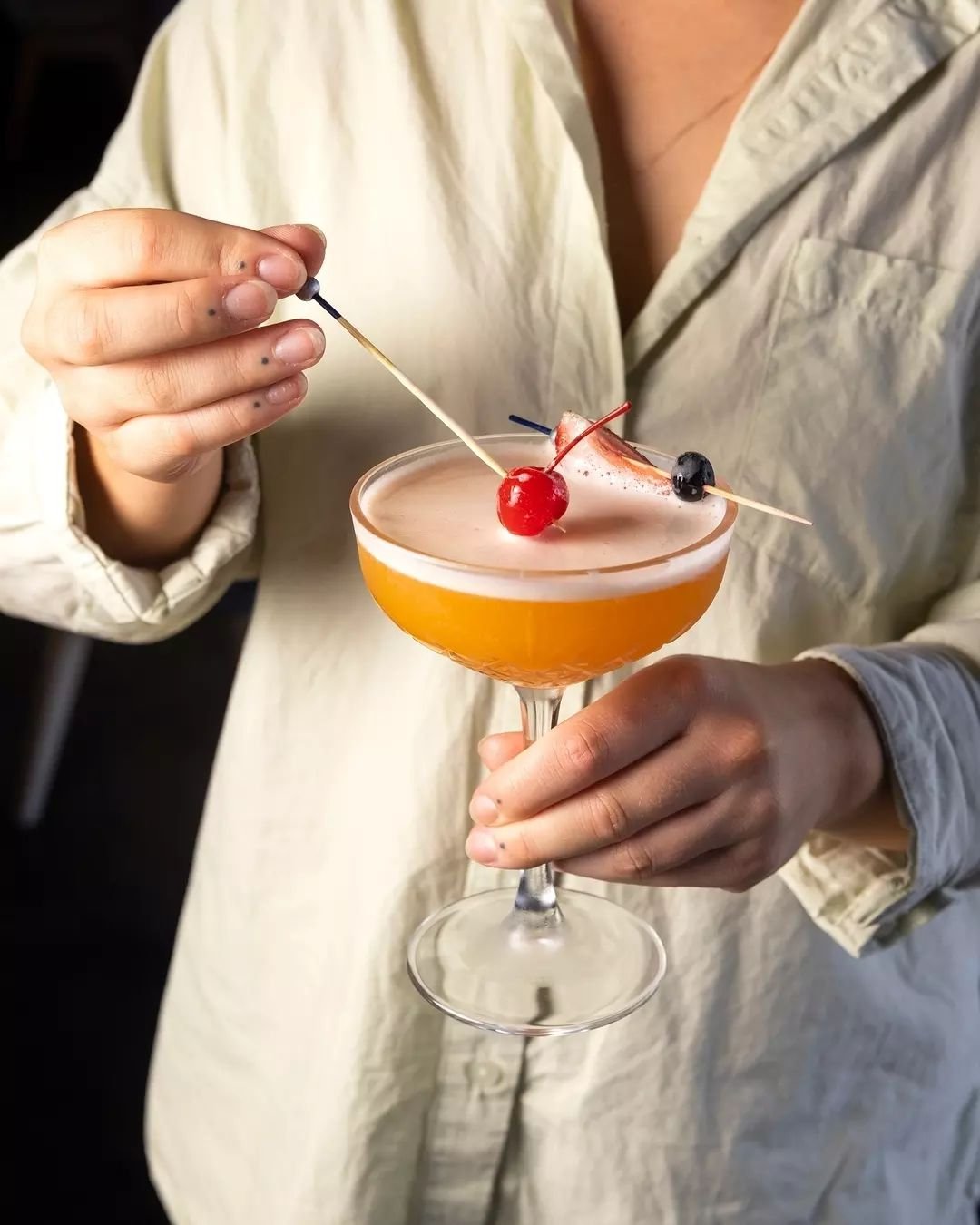 Amaretto Sour! Sweet 'n' sour - frothy with an almond buzz. Best topped with a maraschino cherry!&nbsp;🍒