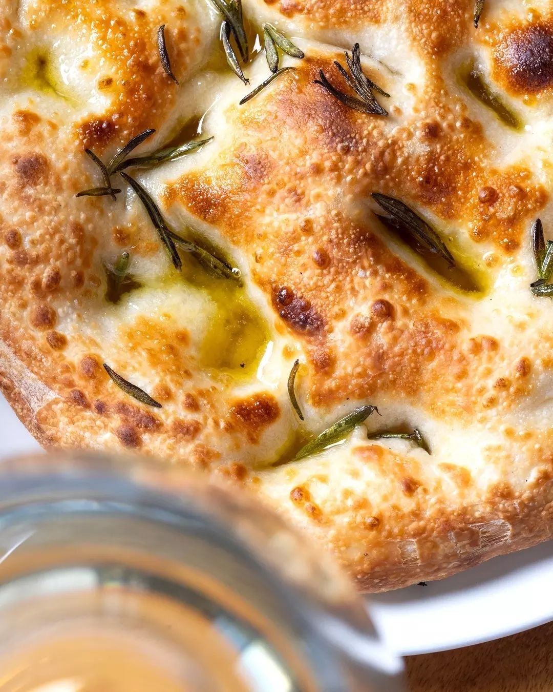 Woodfired focaccia with rosemary, Sicilian sea salt and olive oil. Mangia!