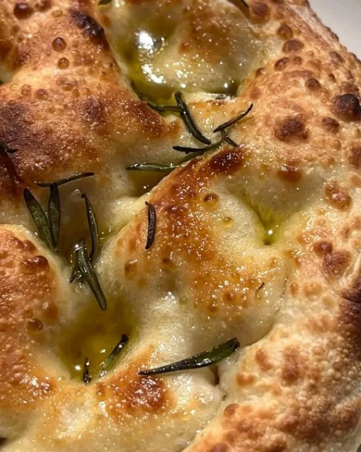 Fresh from the woodfire&nbsp;🔥&nbsp;Focaccia with rosemary, Sicilian sea salt and olive oil.