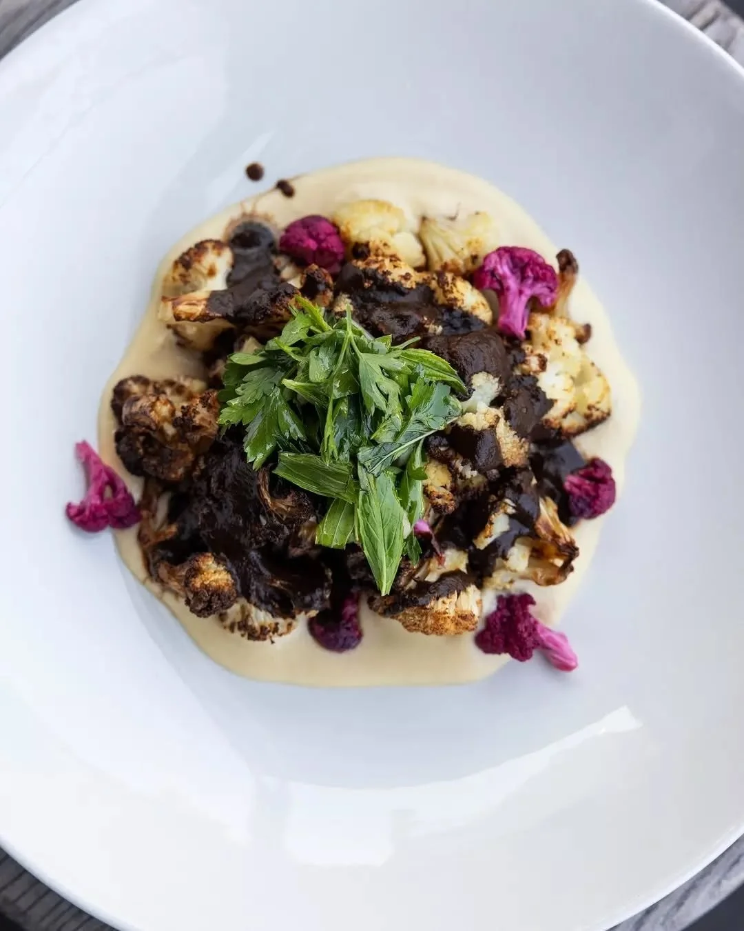 Ask Chef Giovanni his go-to and he&rsquo;ll point you here. Cavolfiore al forno. Roasted cauliflower, black garlic dressing, pickle cauliflower &amp; cauliflower puree.

*Vegan option available