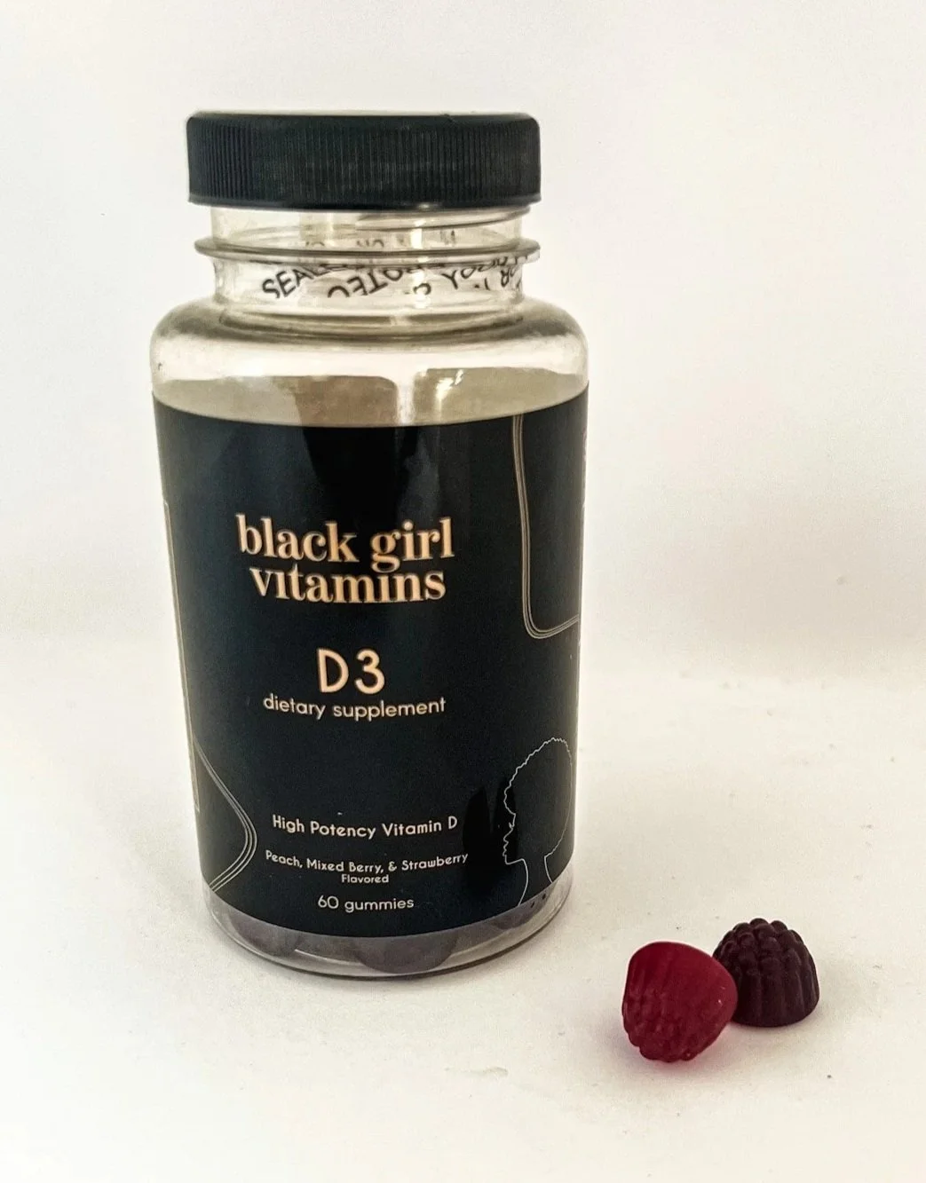 Black Girl Bitamins, vitamin D3 high-potency gummies in mixed berry and strawberry flavors. 60 count vitamin D supplement for melanated skin wellness.