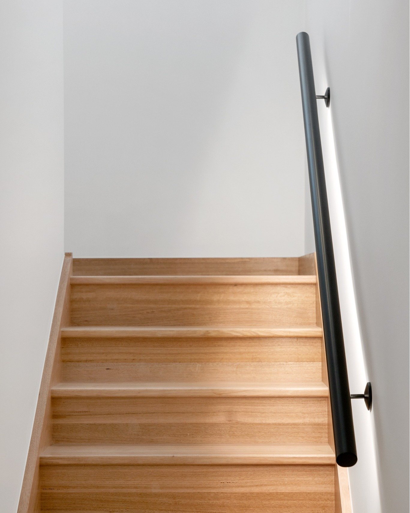 ROSTREVOR III | Timber &amp; Stone...

Another look back at Rostrevor III, where the warm timber of the staircase and eaves sits beautifully against grey stone cladding and flooring. It's that considered layering of natural timber and stone that ties