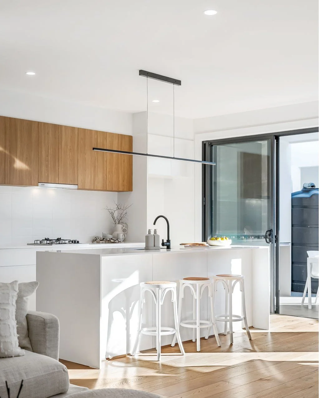 Timber-toned cabinetry, sleek matte black @aldertapware, and an oversized @stoneambassadoraus island bench - the kitchen at Cumberland Park I was designed to work as hard as it looks good.

It's finishes like these that set a development apart, helpi