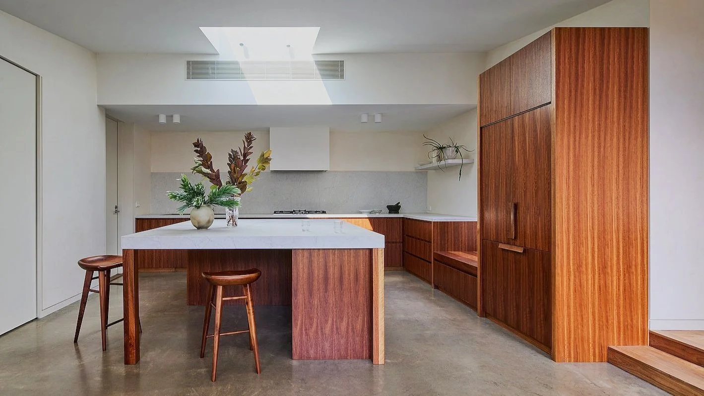 Light-filled Spotted Gum kitchen highlighting the natural warmth of the material. Functionality and work-flow being the aim.