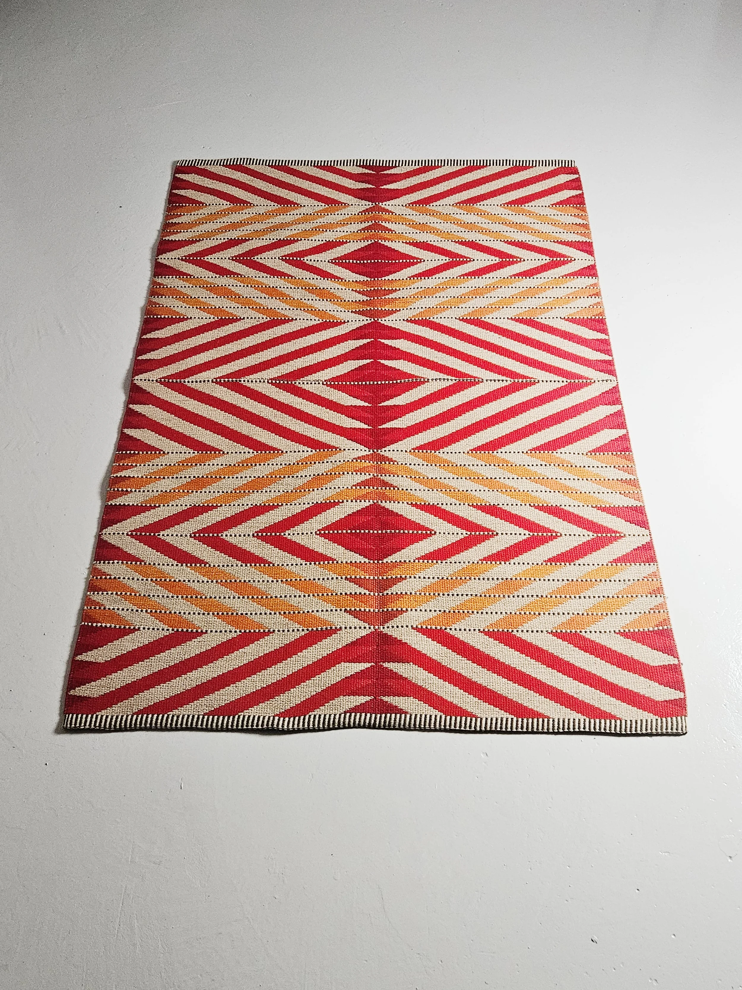 Reversible flatweave carpet by Ingrid Dessau