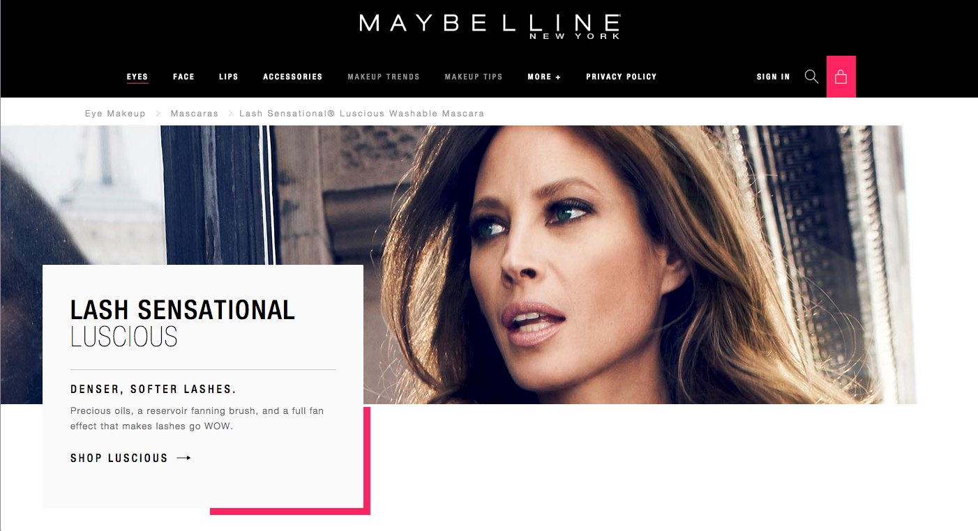 Maybelline advertisement for Lash Sensational Luscious mascara featuring a model with lush eyelashes. Text highlights the mascara's features for denser, softer lashes.