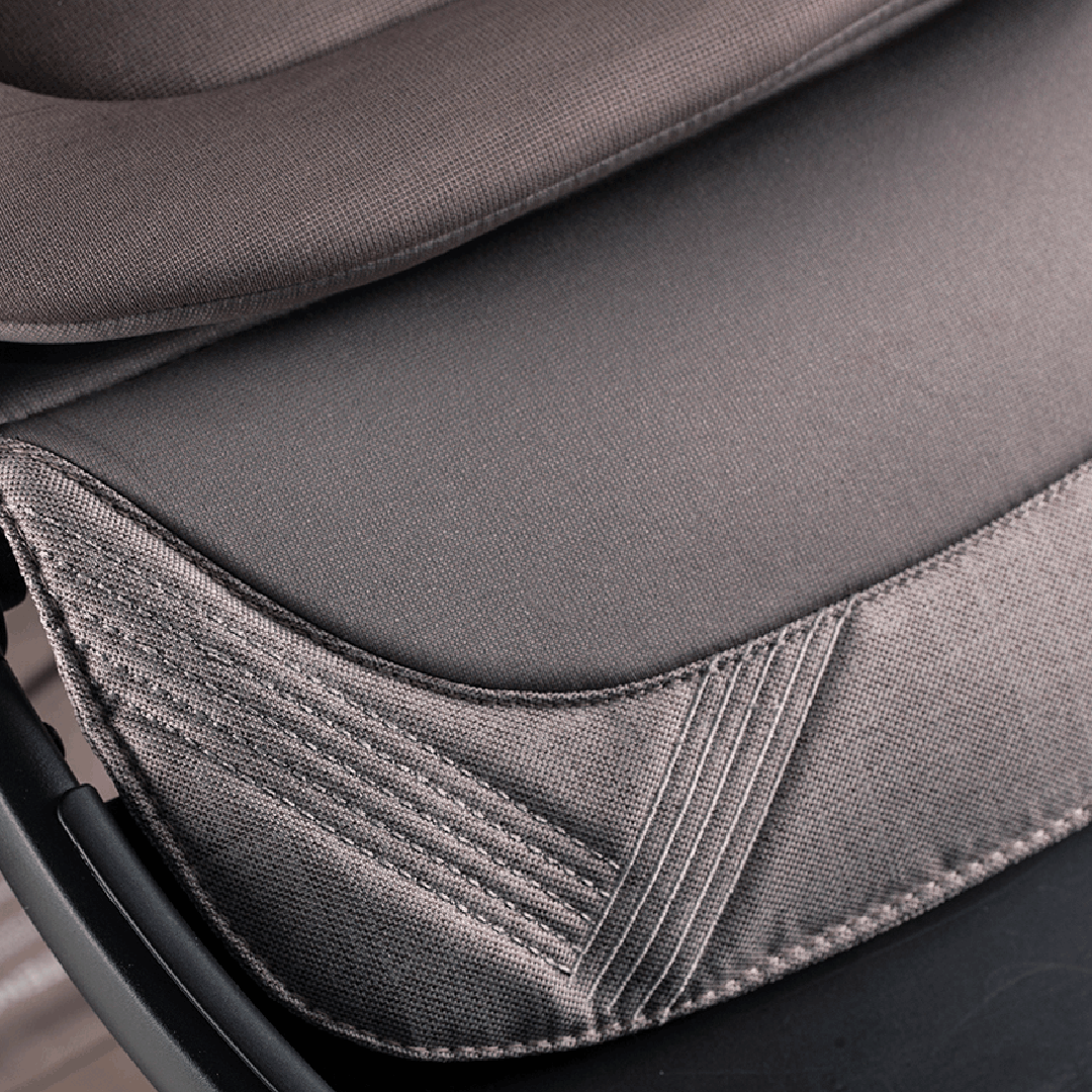 Detailed stitching on the stroller seat insert