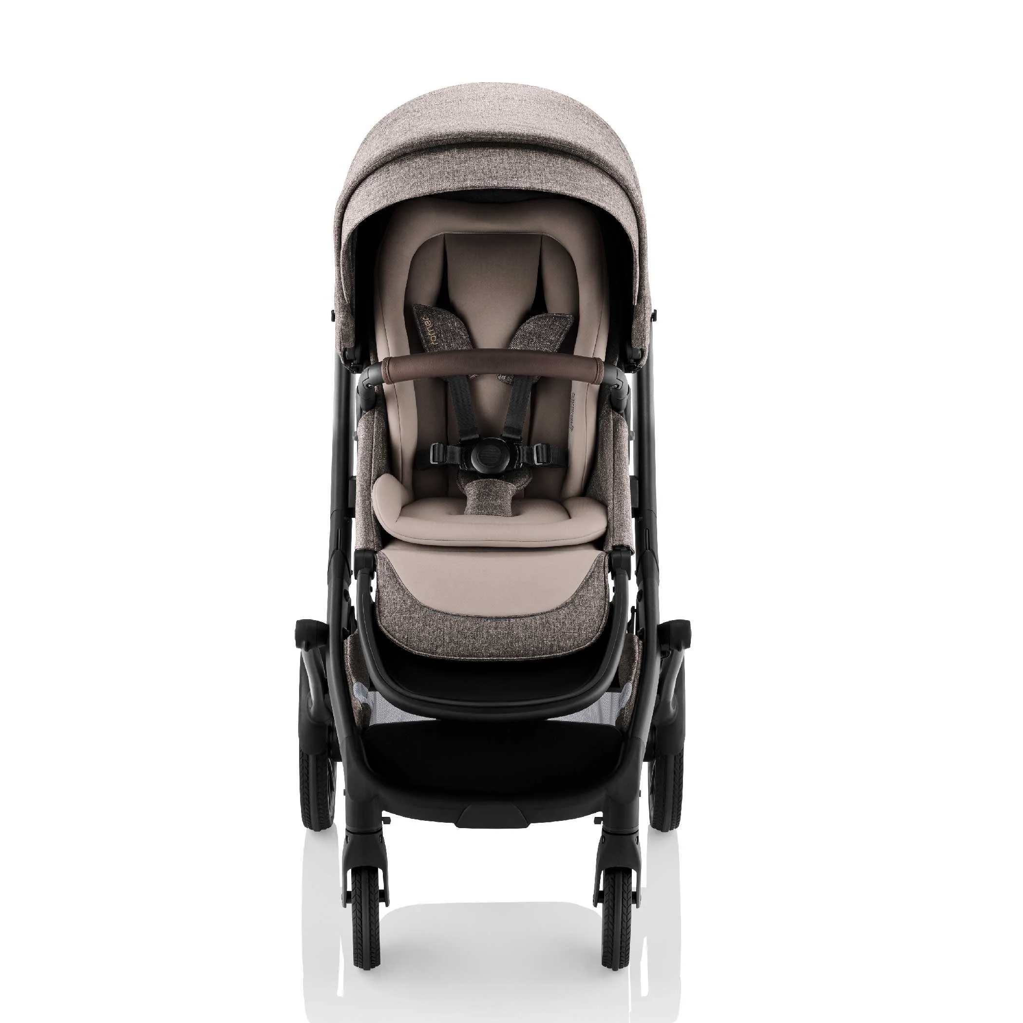 Brown and tan baby stroller with leather on the bumper bar.