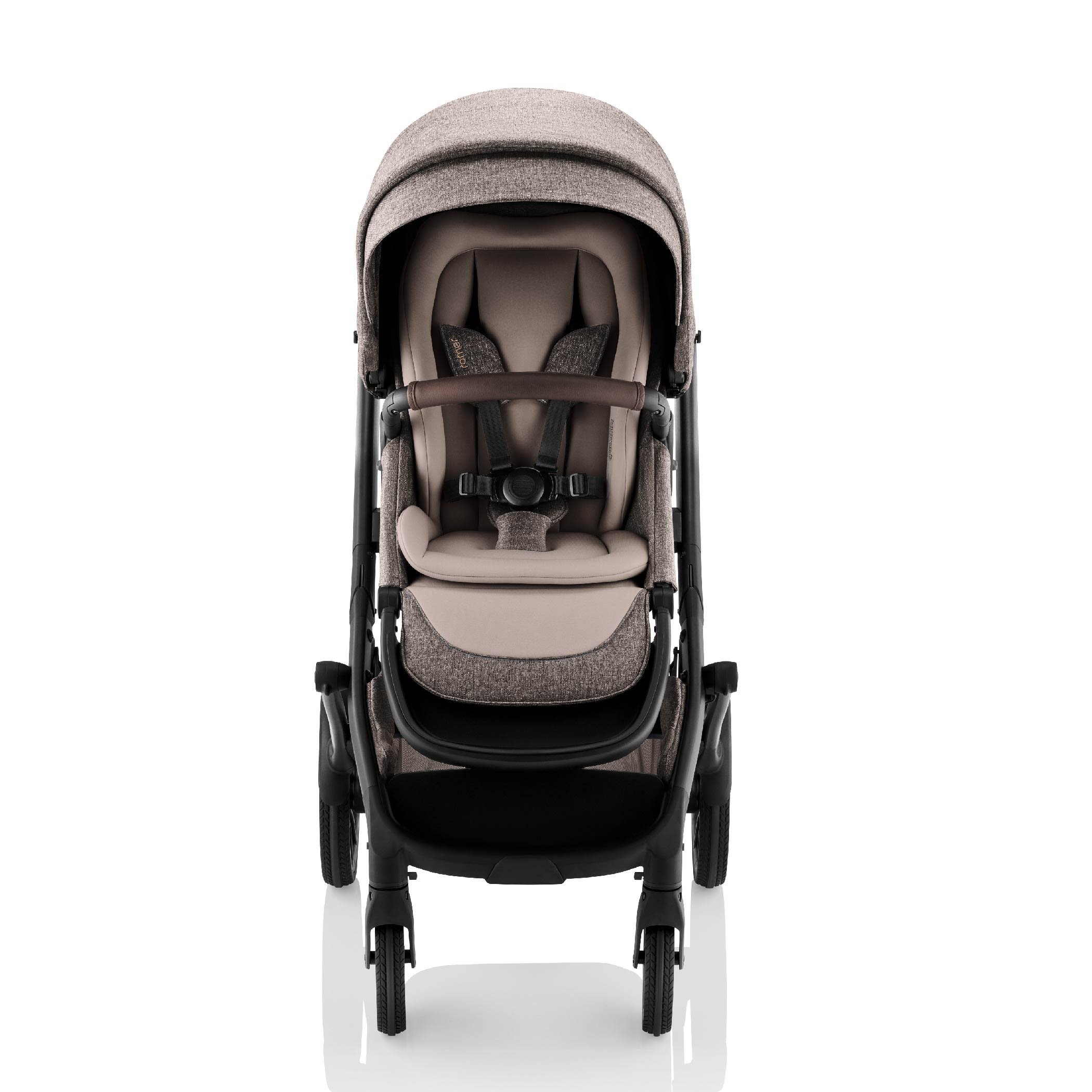 Brown and tan baby stroller with leather on the bumper bar.