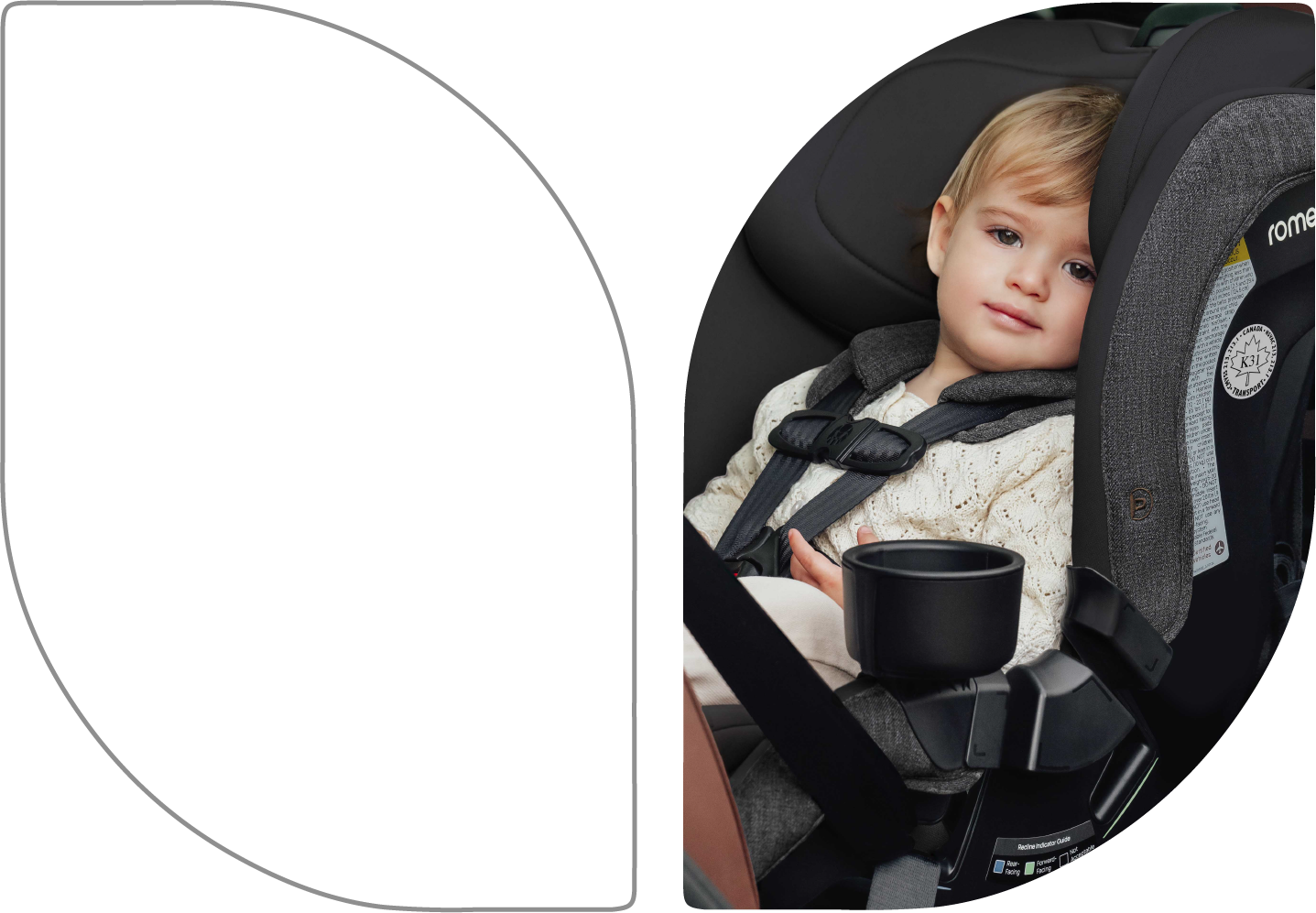 A toddler in a rear-facing car seat.
