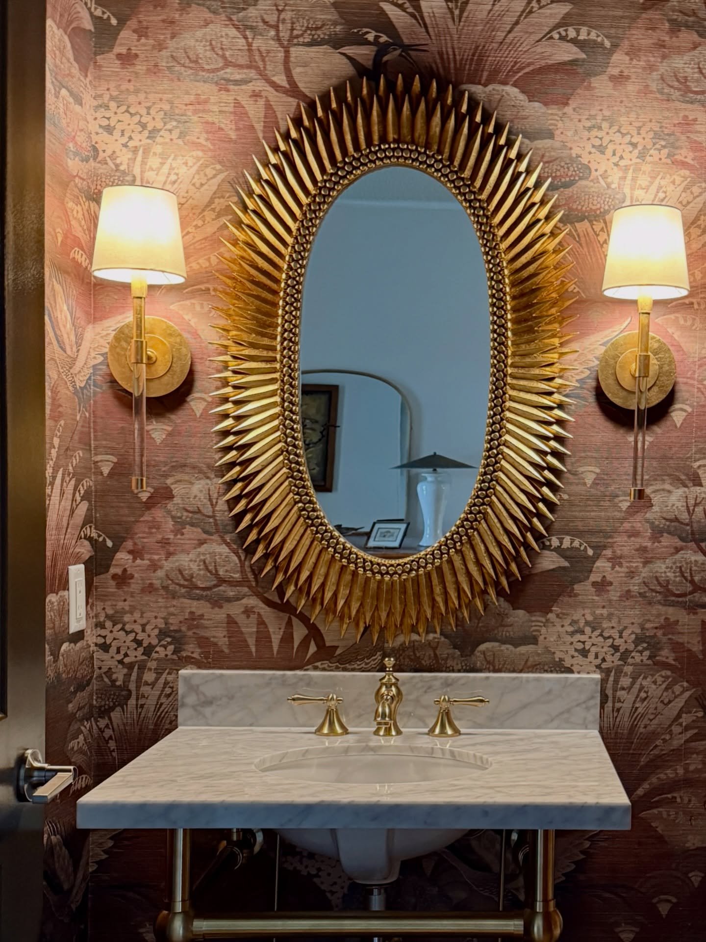 This space was designed to lean into mood.
Layered pattern, warm tones, and soft lighting create a room that feels intimate the moment you step inside.

The scale is small, but the experience is not.

Every element was chosen to work together.
The wa