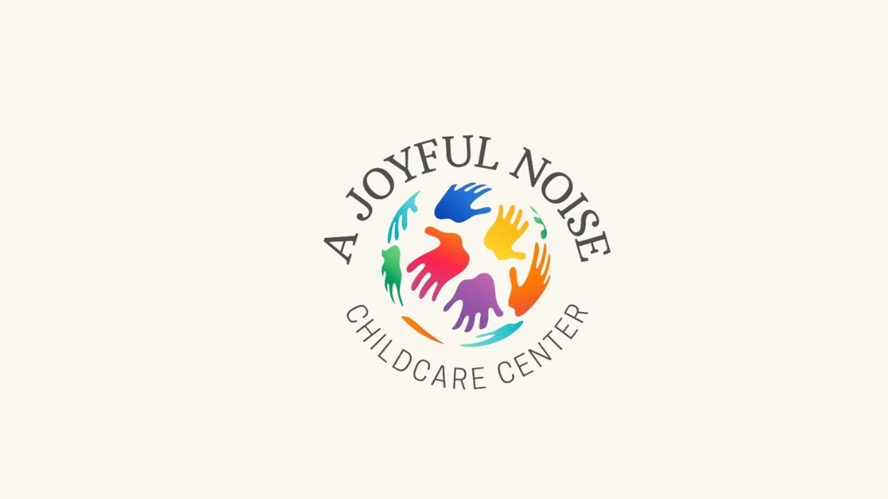 Logo for A Joyful Noise Childcare Center featuring colorful handprints in a circular arrangement.