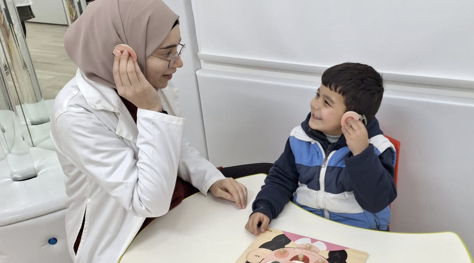 Case study: Mohammad and Zain’s journey to hearing
