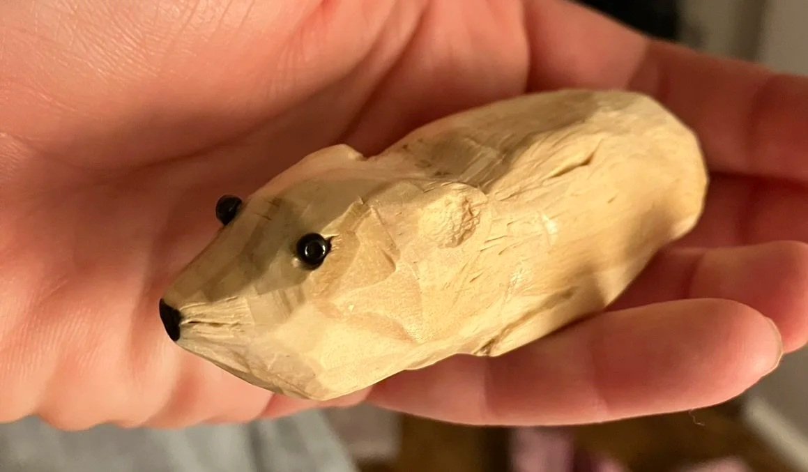 hand carved wood vole, glass eyes