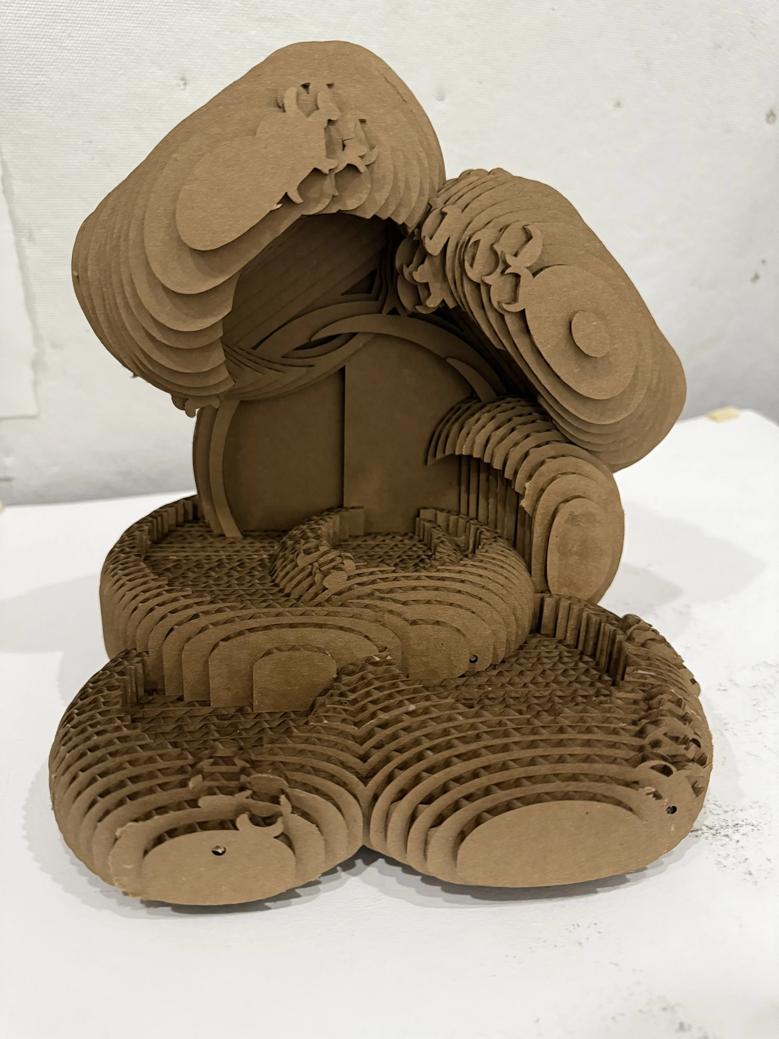 Barnacle, Laser cut cardboard, 2025, 8x8x6 inches
