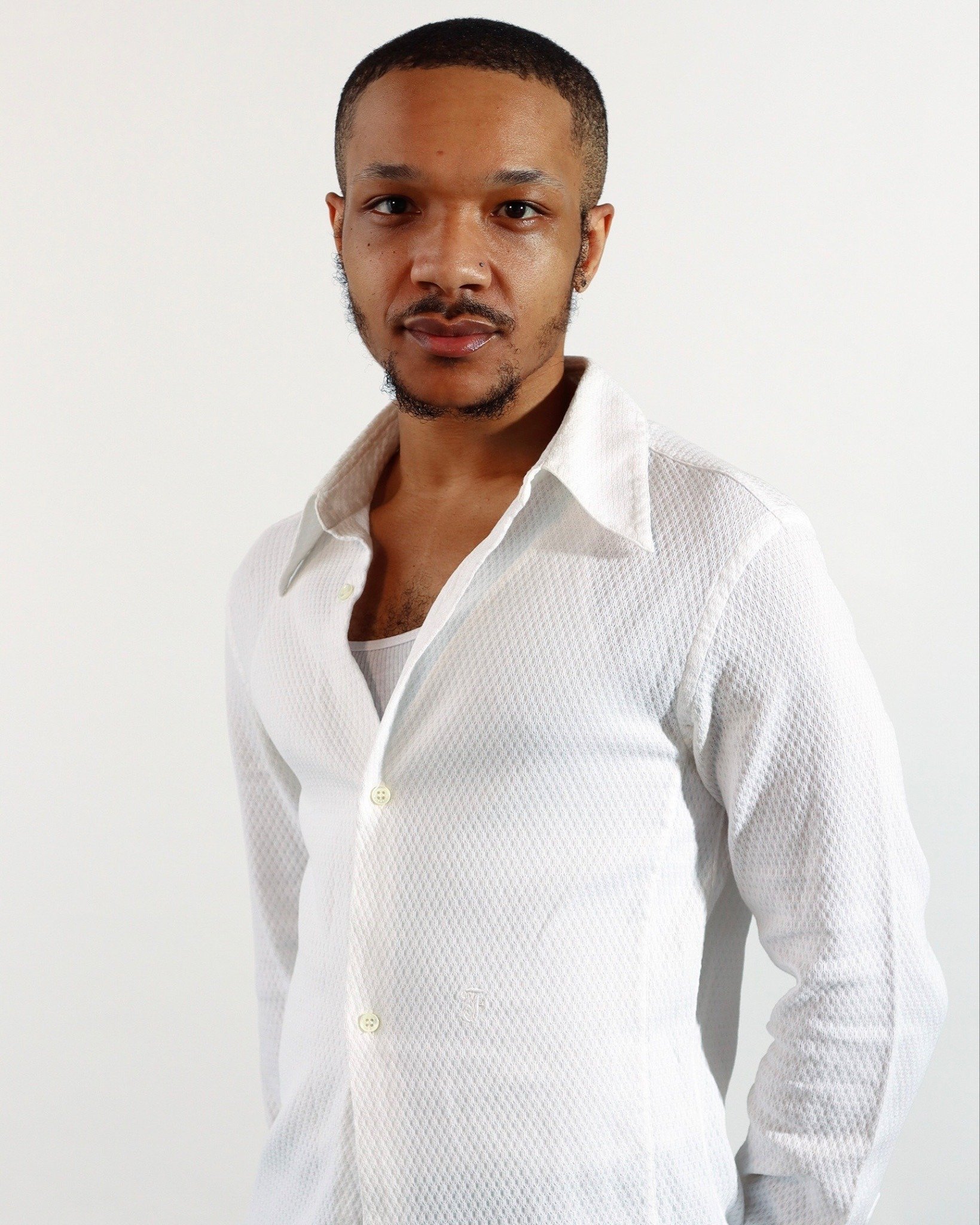 Eric Willingham is a multi-hyphenate artist and creative producer reimagining socially conscious expression across music, performance, and visual media. Through legacy-driven narratives, his work explores the intersections of memory and identity, cha