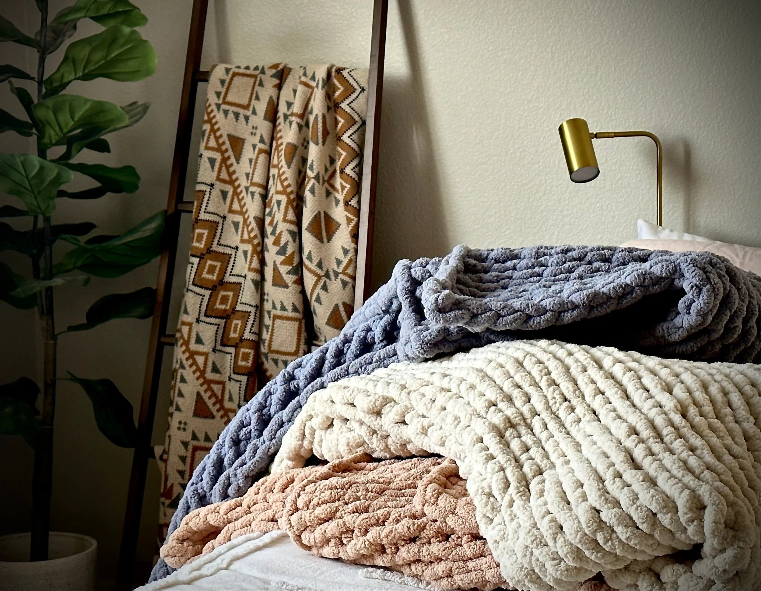 Blanket Trio with ladder backdrop.jpeg