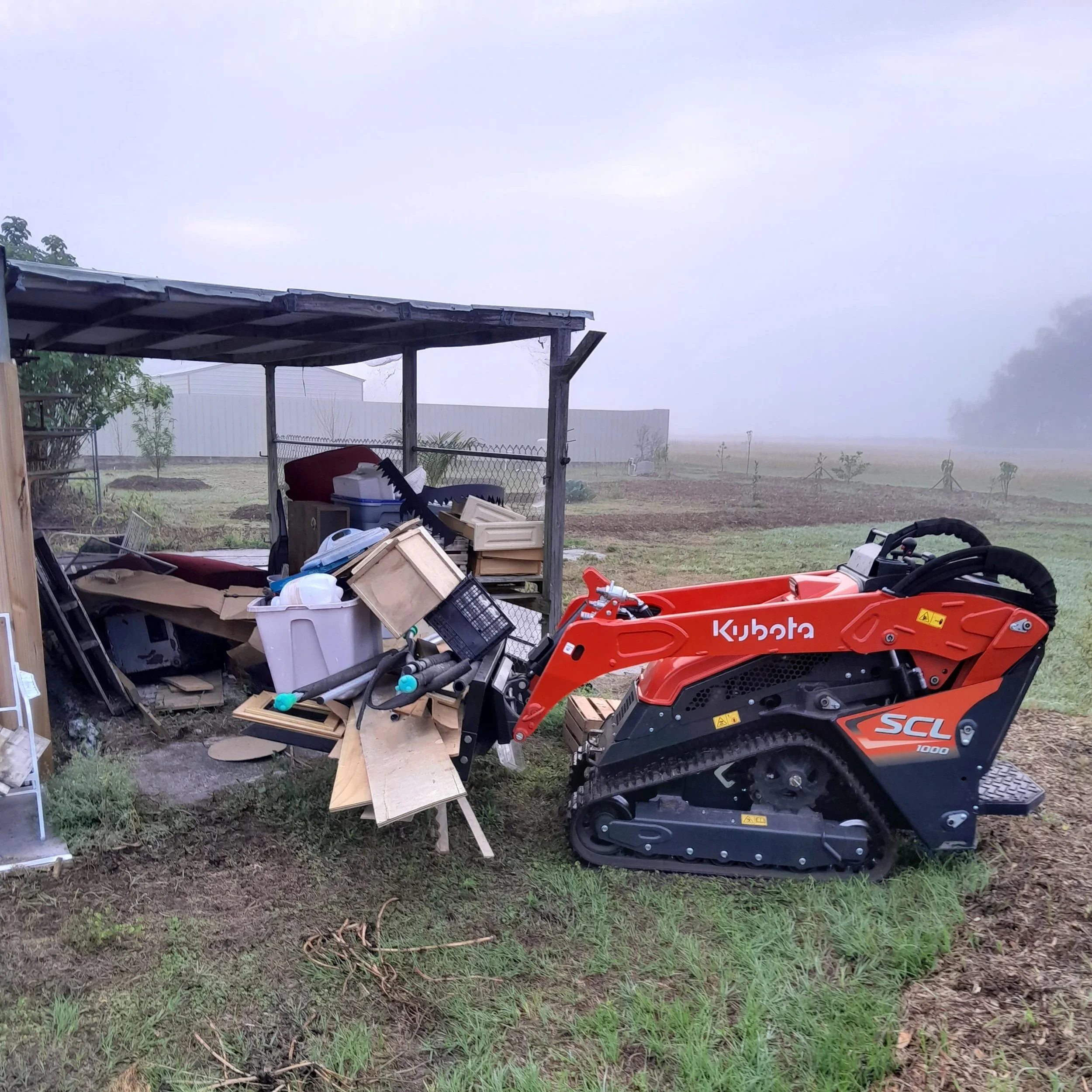 How Mini Skid Steers Are Revolutionizing the Heavy Junk Hauling Game