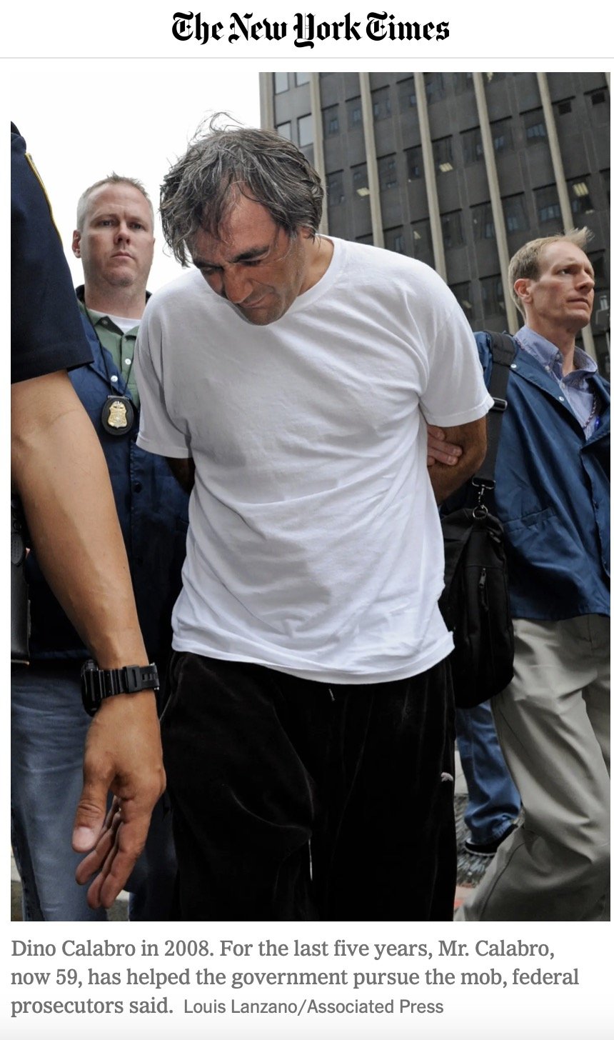 FBI agent Scott Curtis (far right) arresting Colombo family soldier Dino Calabro in 2008