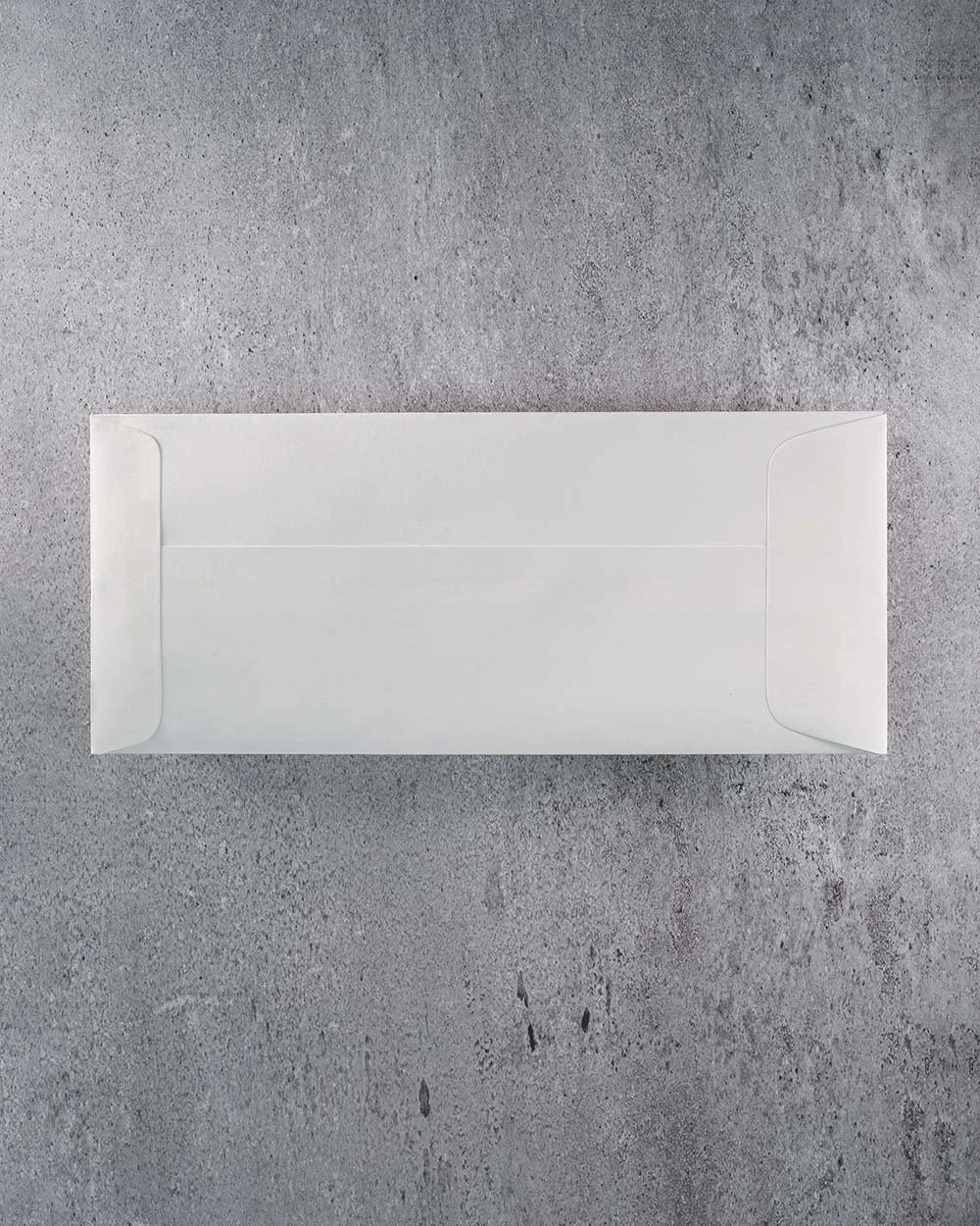 Pride Ally Card displayed with its coordinating white envelope on a textured gray background.