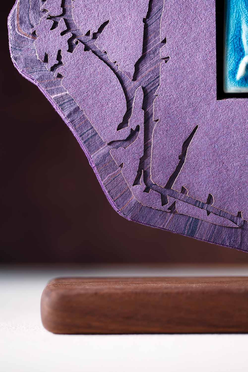 Close-up of a custom wedding sign highlighting layered paper construction, die-cut edges, and dimensional handcrafted details.