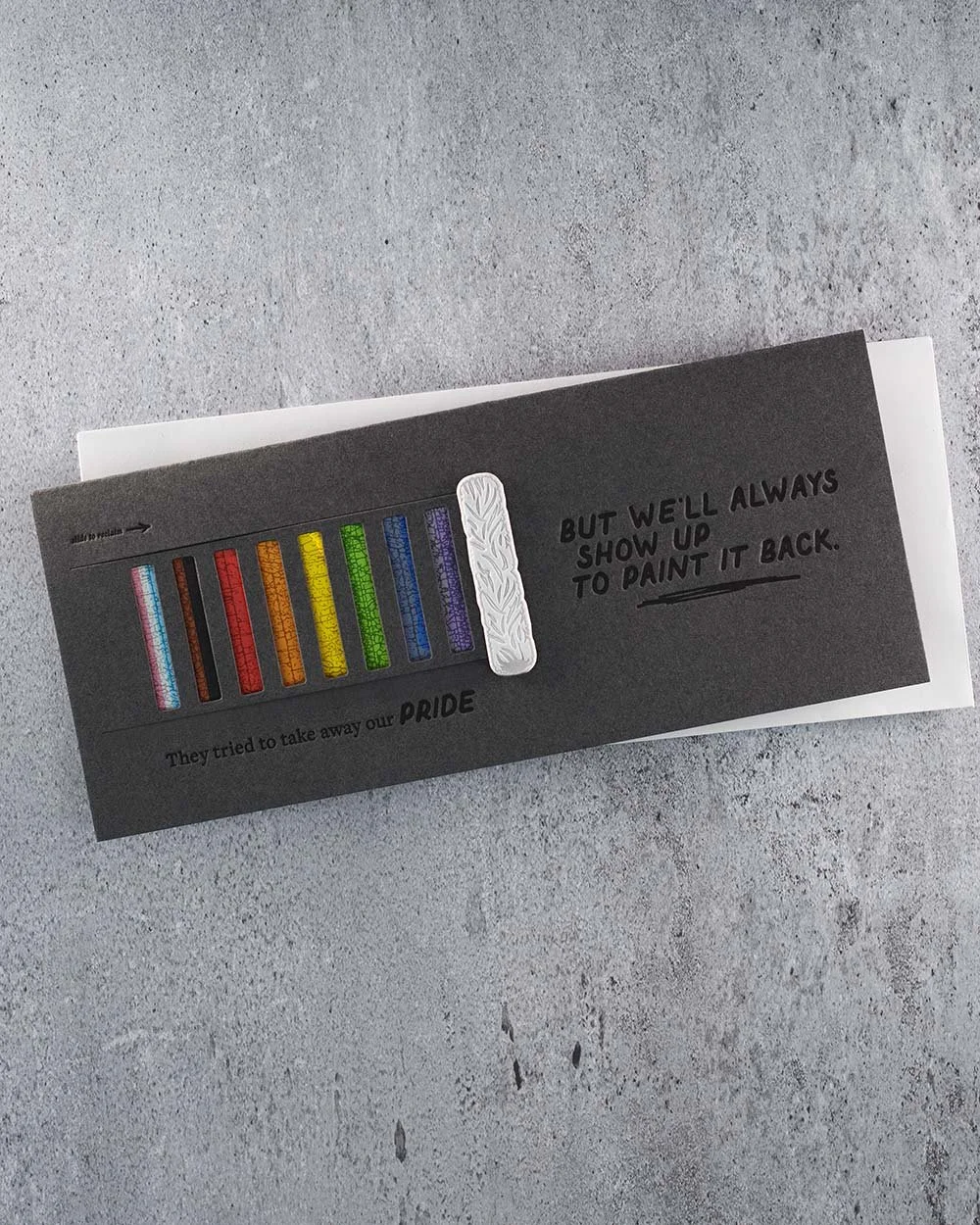 Interactive LGBTQ+ pride greeting card with a movable paint roller revealing the colors of the Progress Pride flag beneath. The card reads, “But we'll always show up to paint it back.”
