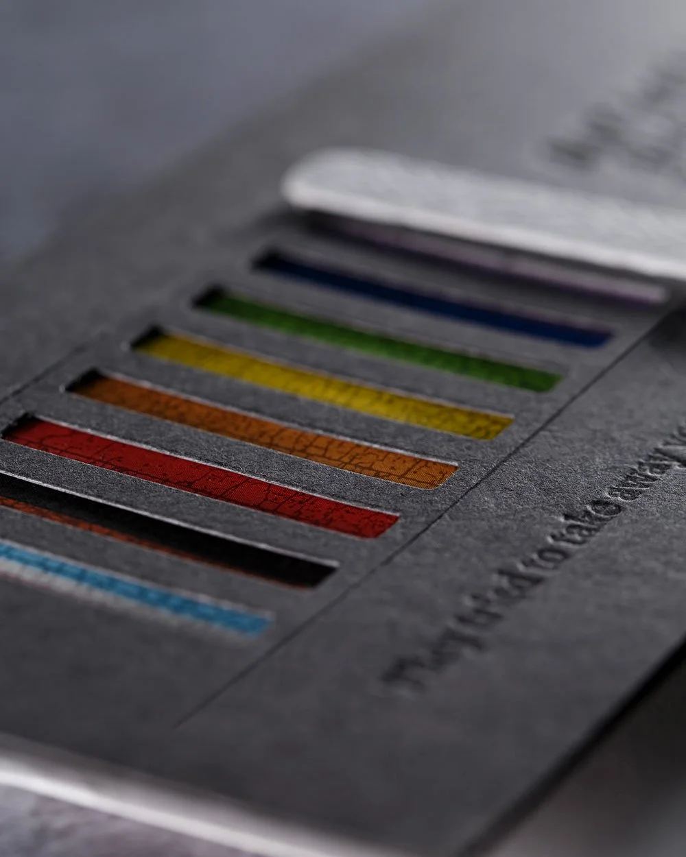 Close-up detail of the Progress Pride Flag colors revealed inside the interactive Pride Ally Card.