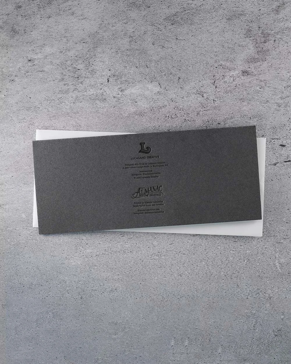 Pride Ally Card displayed with its coordinating white envelope on a textured gray background.