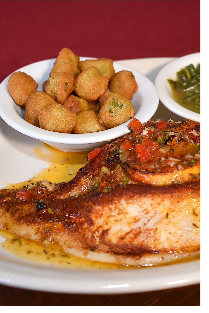 The flounder filet, broiled and paired with fried okra and green beans.