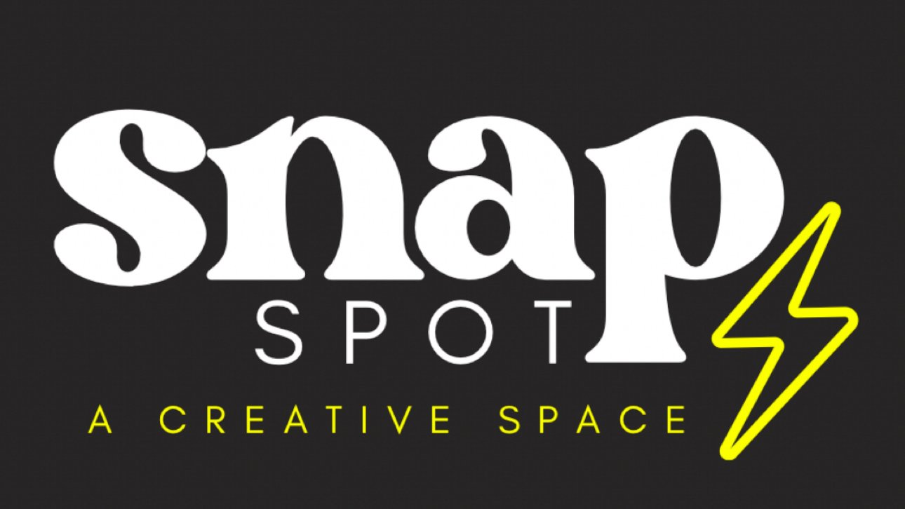 Logo for Snapp Spot, a creative space, with the words "Snapp Spot" in large white letters on a black background, a yellow lightning bolt, and the phrase "A Creative Space" in yellow at the bottom.
