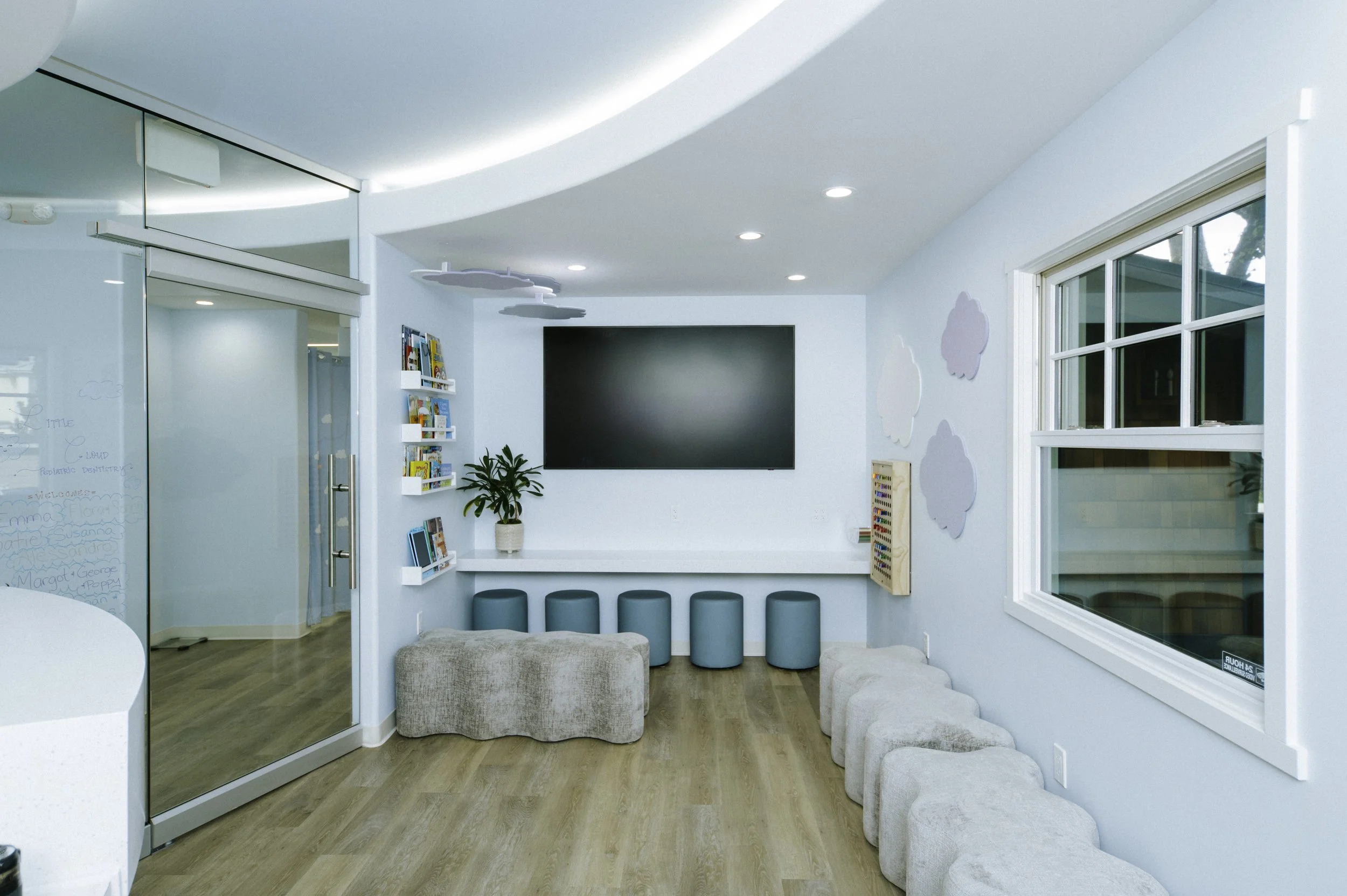 Curved dropped ceilings make the upper ceilings seem to float. A large t.v. is provided for helpful videos and movies. 