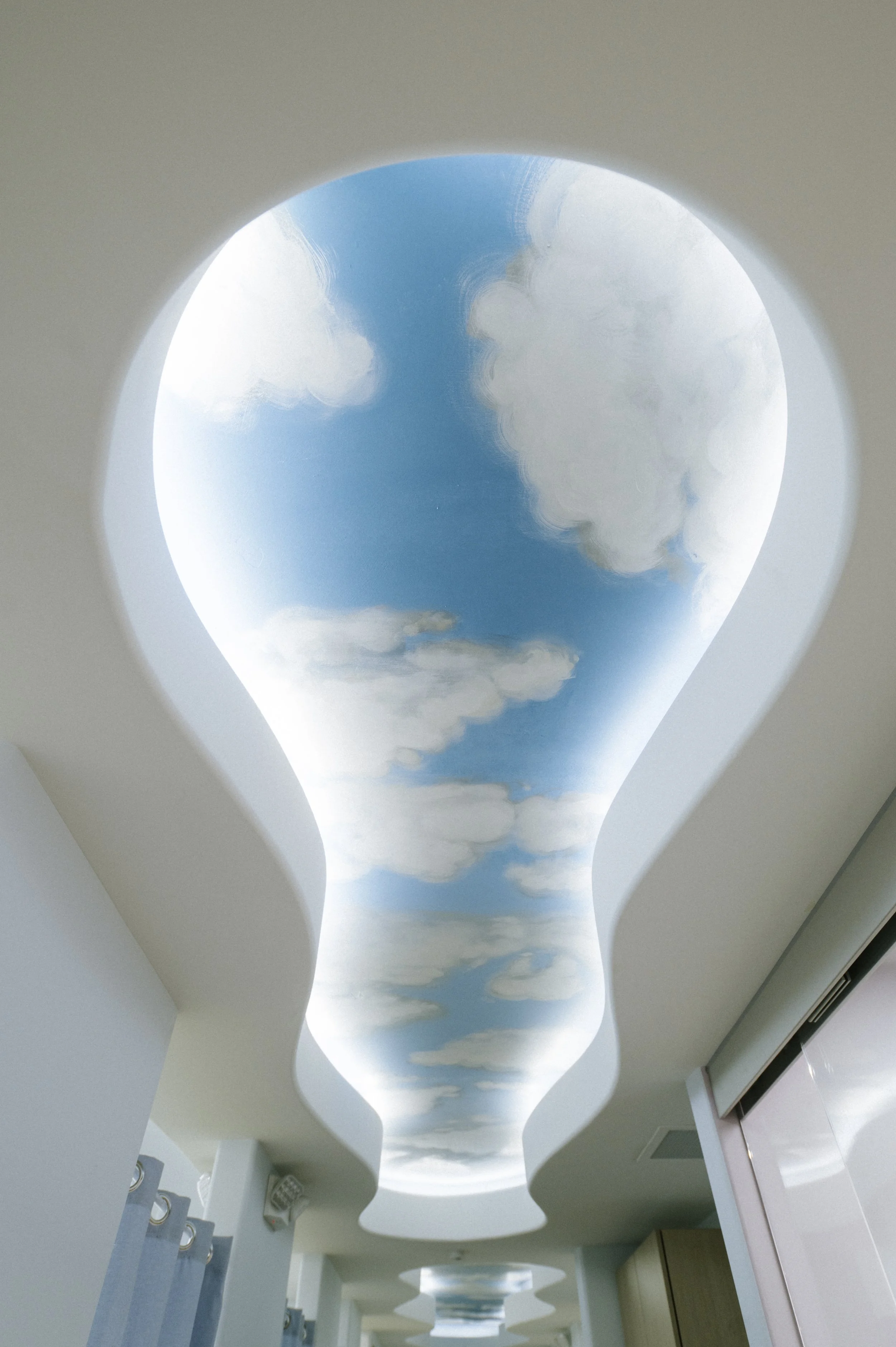 The cloud shaped opening in the ceiling offers an opportunity for hand painted clouds and recessed lighting.
