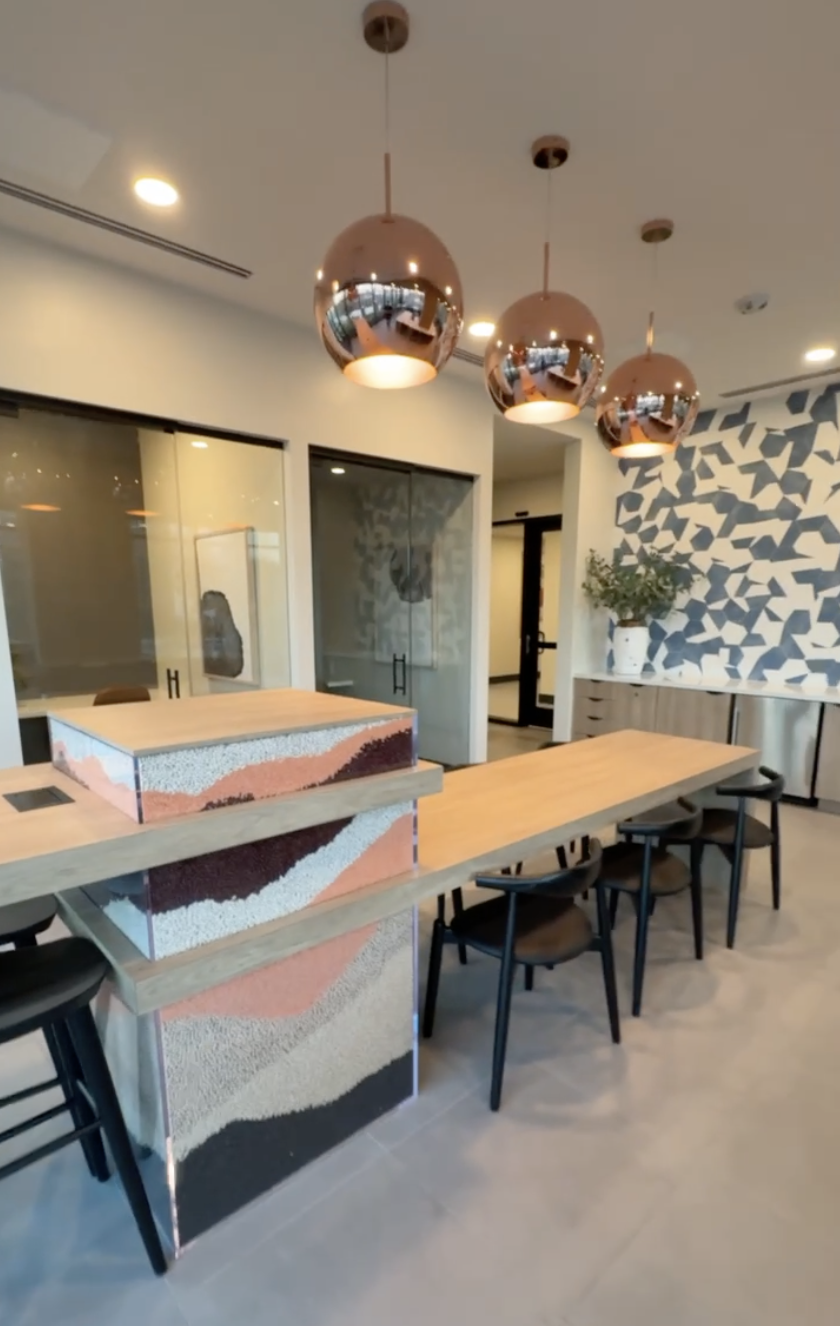 Trestle amenity featuring custom designed + built communal table. MONROVIA, CA