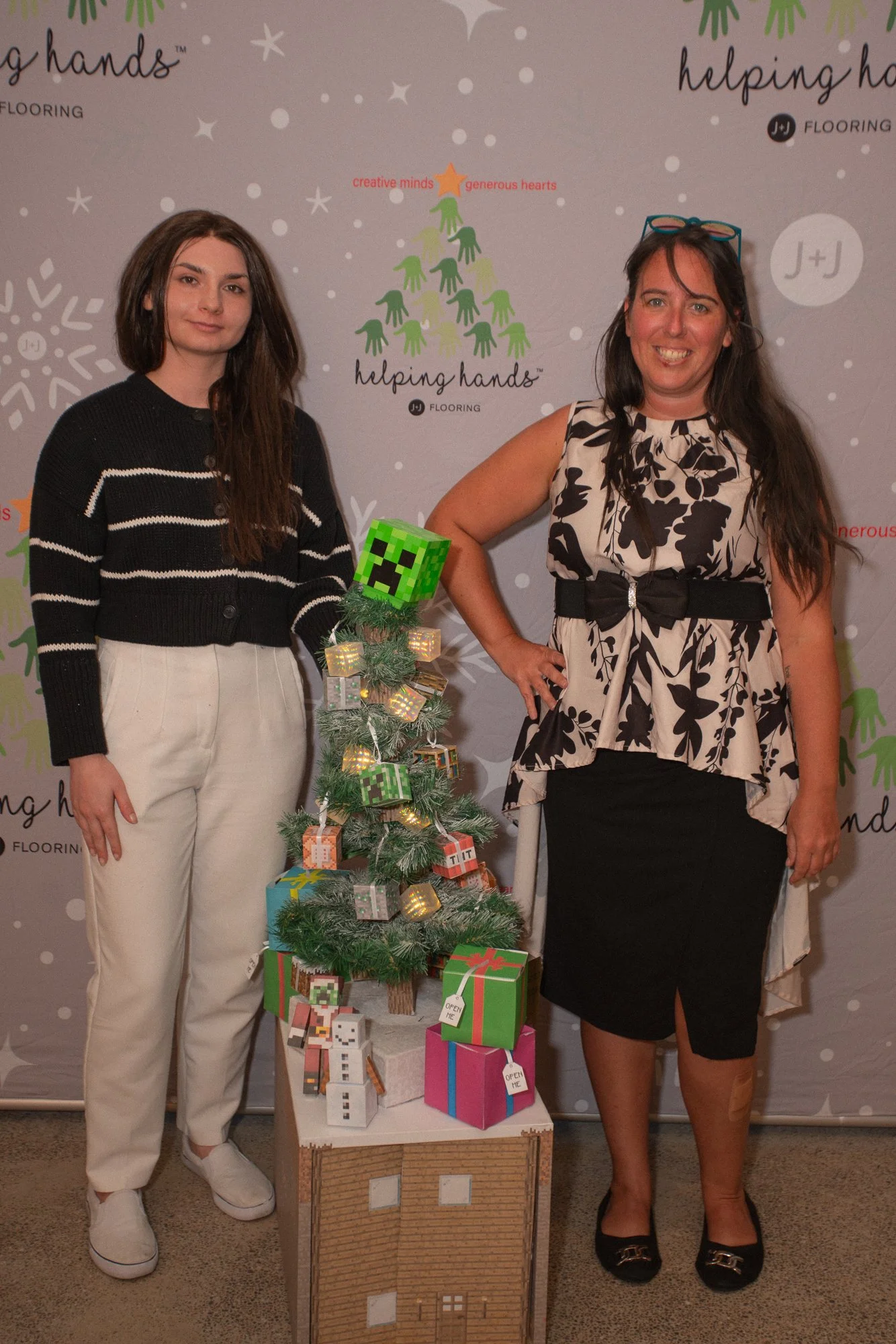 Martha + Juliana pose with our Minecraft inspired christmas tree!