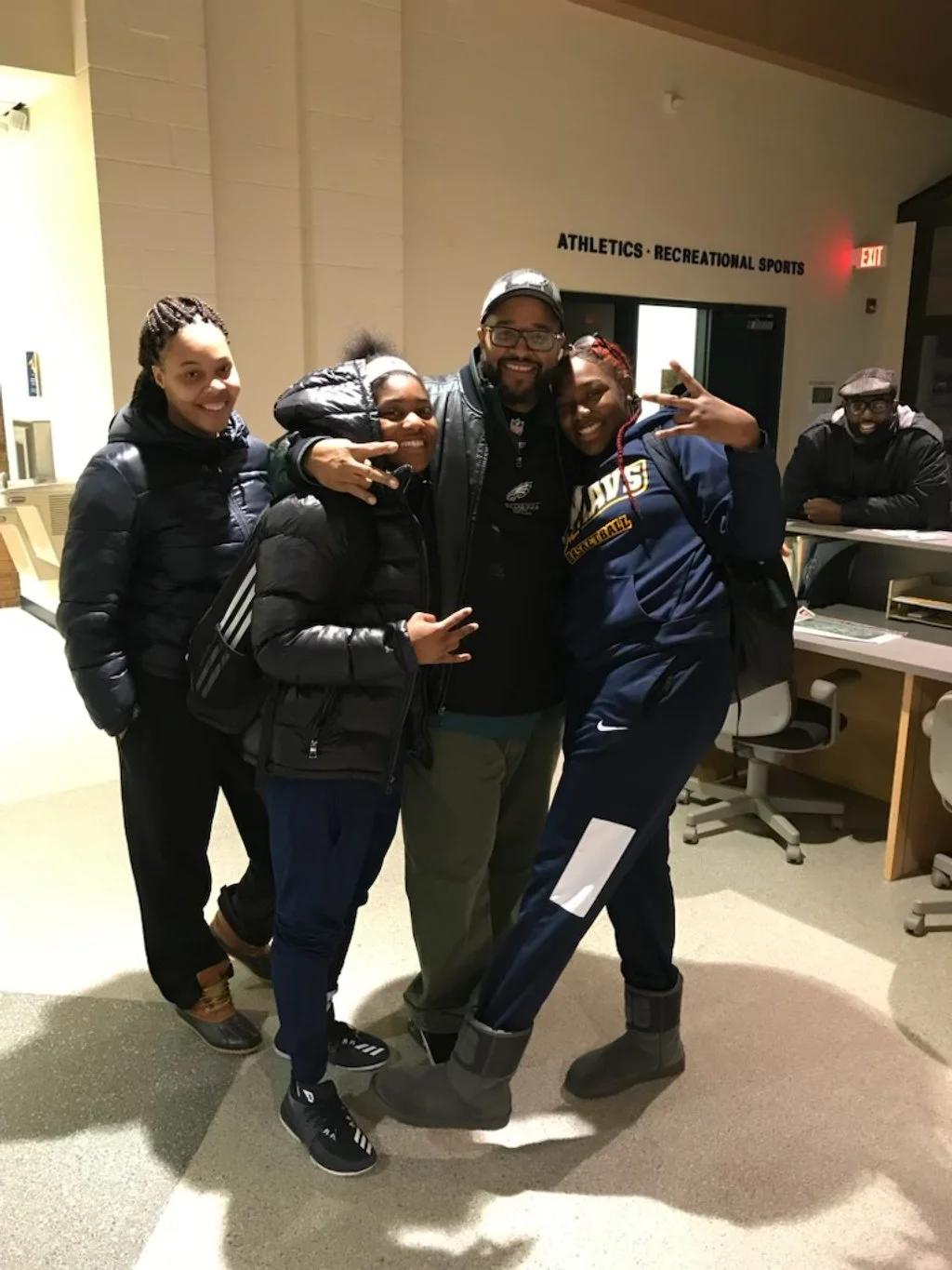 A group of teammates, ready for the camera. 
