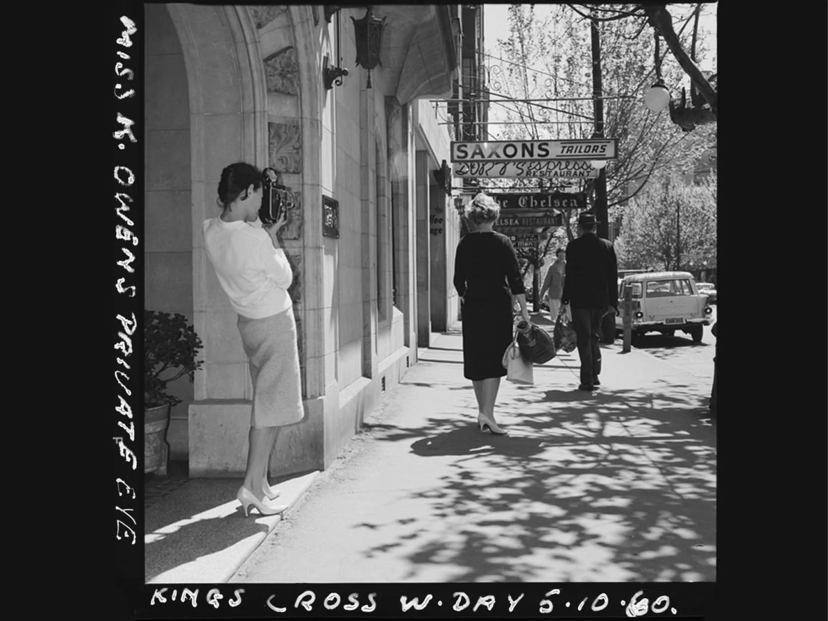 Miss K. Owens, private eye, at the doorway of Franconia, Macleay St. 1960. (Credit: State Library of New South Wales)