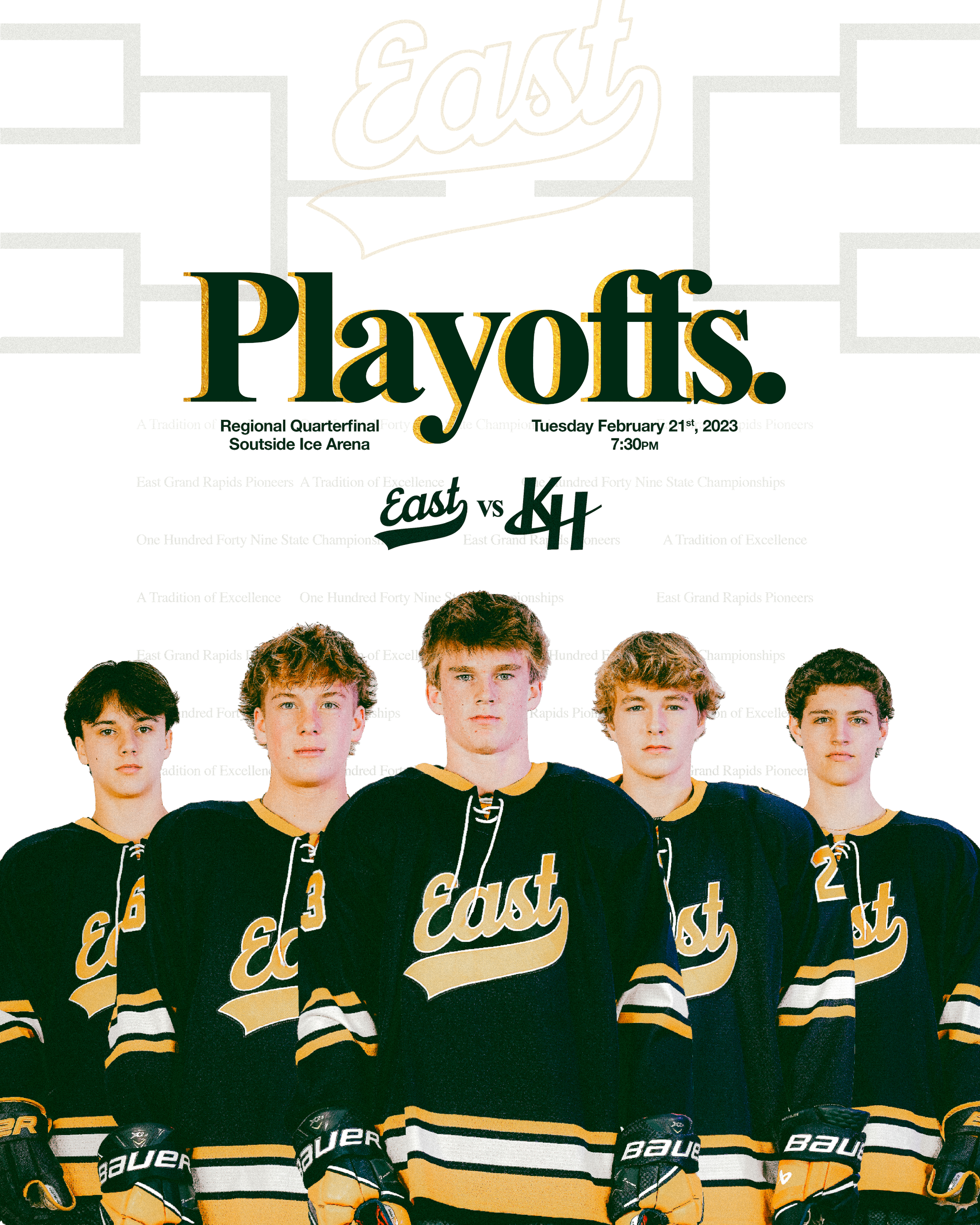A hockey team lineup with players in black and gold uniforms, standing on the ice with hockey sticks, wearing gloves and skates, during a team photo session.