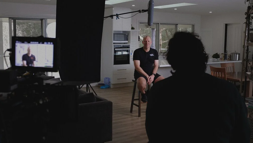 Of Place Films founder and director, Mitchell Withers on set