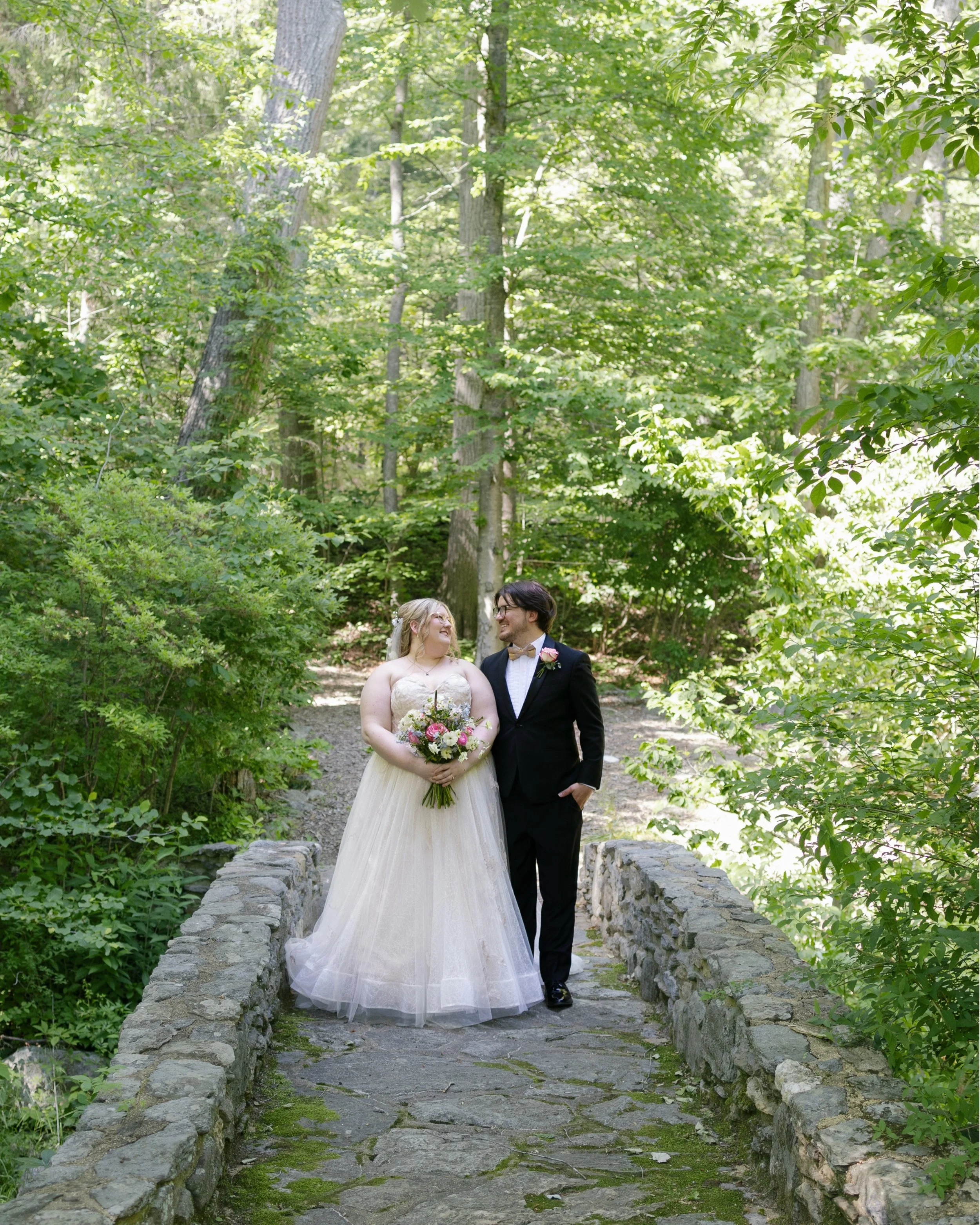 Two theater kids get married in the middle of the woods 🎭

Actually, it was so much more than that.

It was all of the little intentional details, like handmade escort cards, a &ldquo;Guess Who?&rdquo; game during cocktail hour featuring all of thei