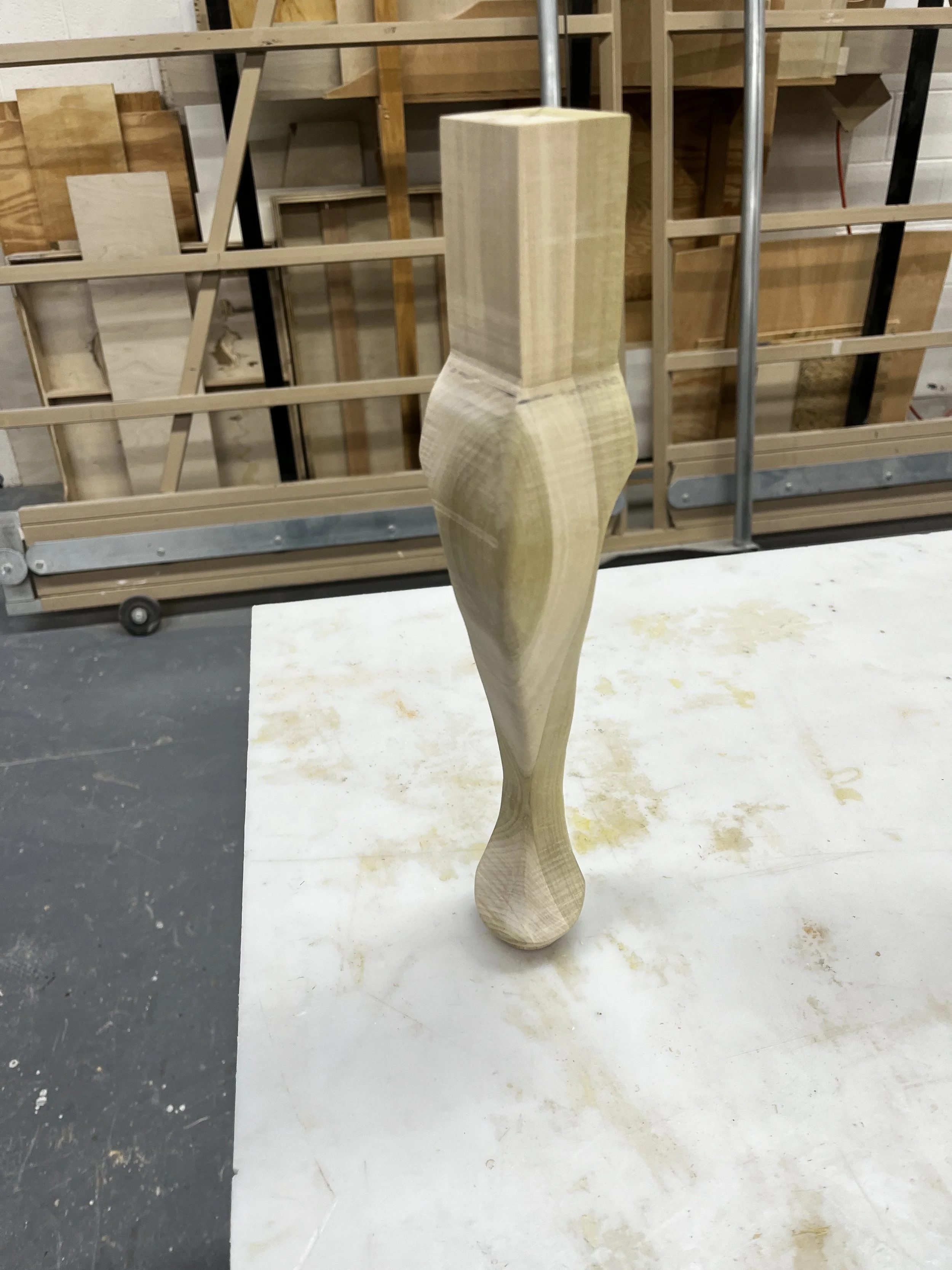 Turned and sculpted cabriole leg