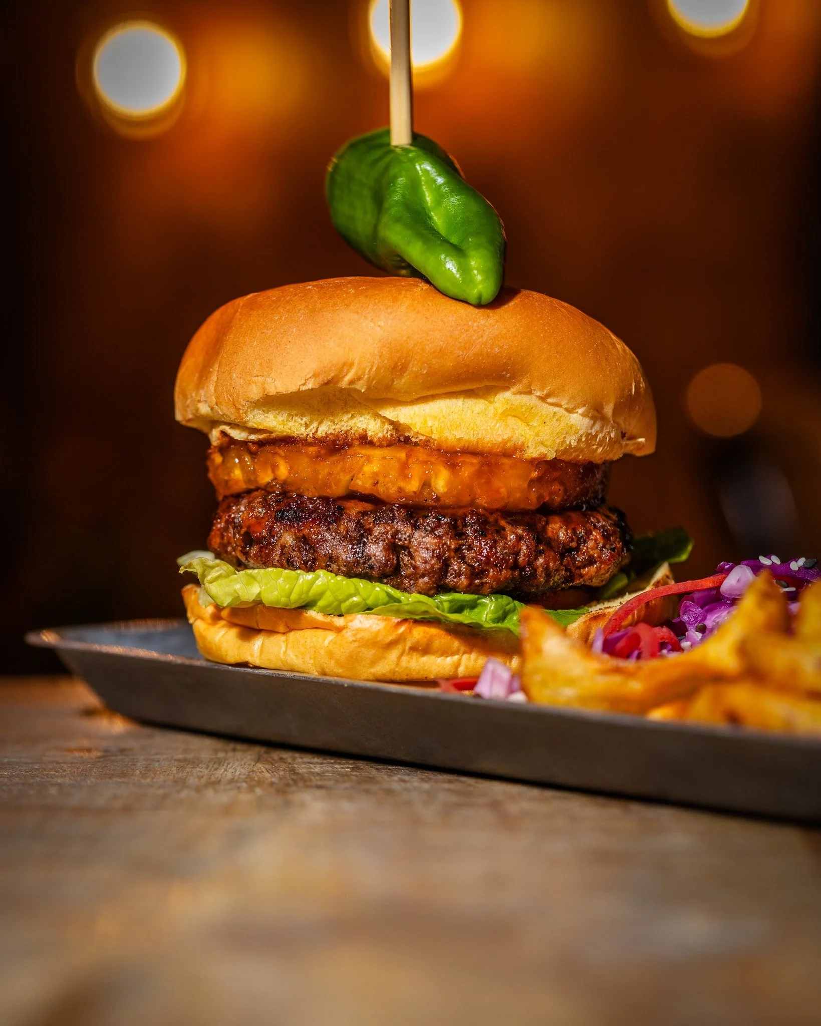 We told you we were making some updates to our menu! We've added two mouth-watering Burger options to our menu. Available as part of our Lunch menu or our Main menu.
House Burger 
Beef Patty + Bacon + Cheese + Padron Pepper + Baby Gem Lettuce
+ Toma