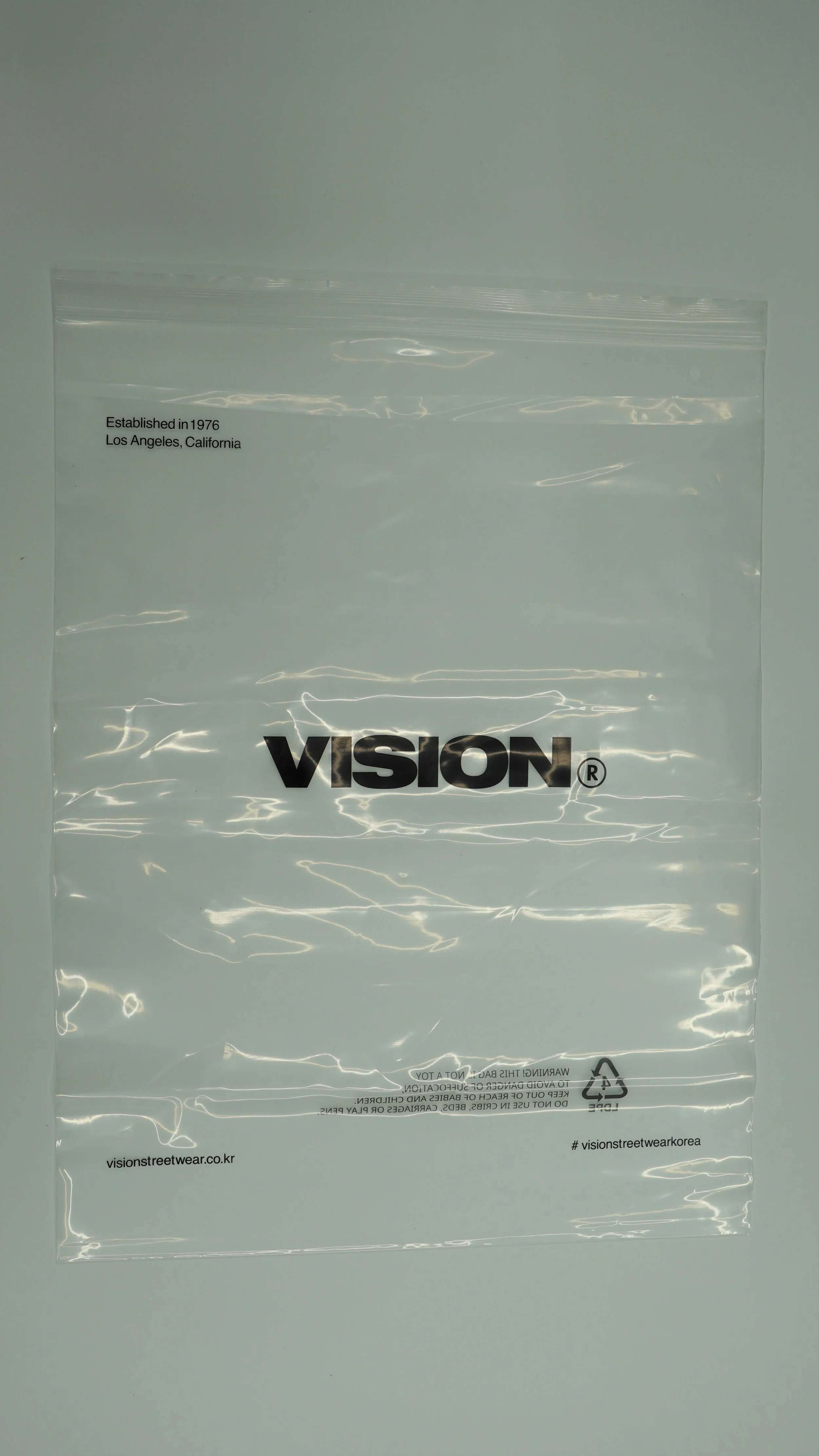 비전스트릿웨어 지퍼백.jpg