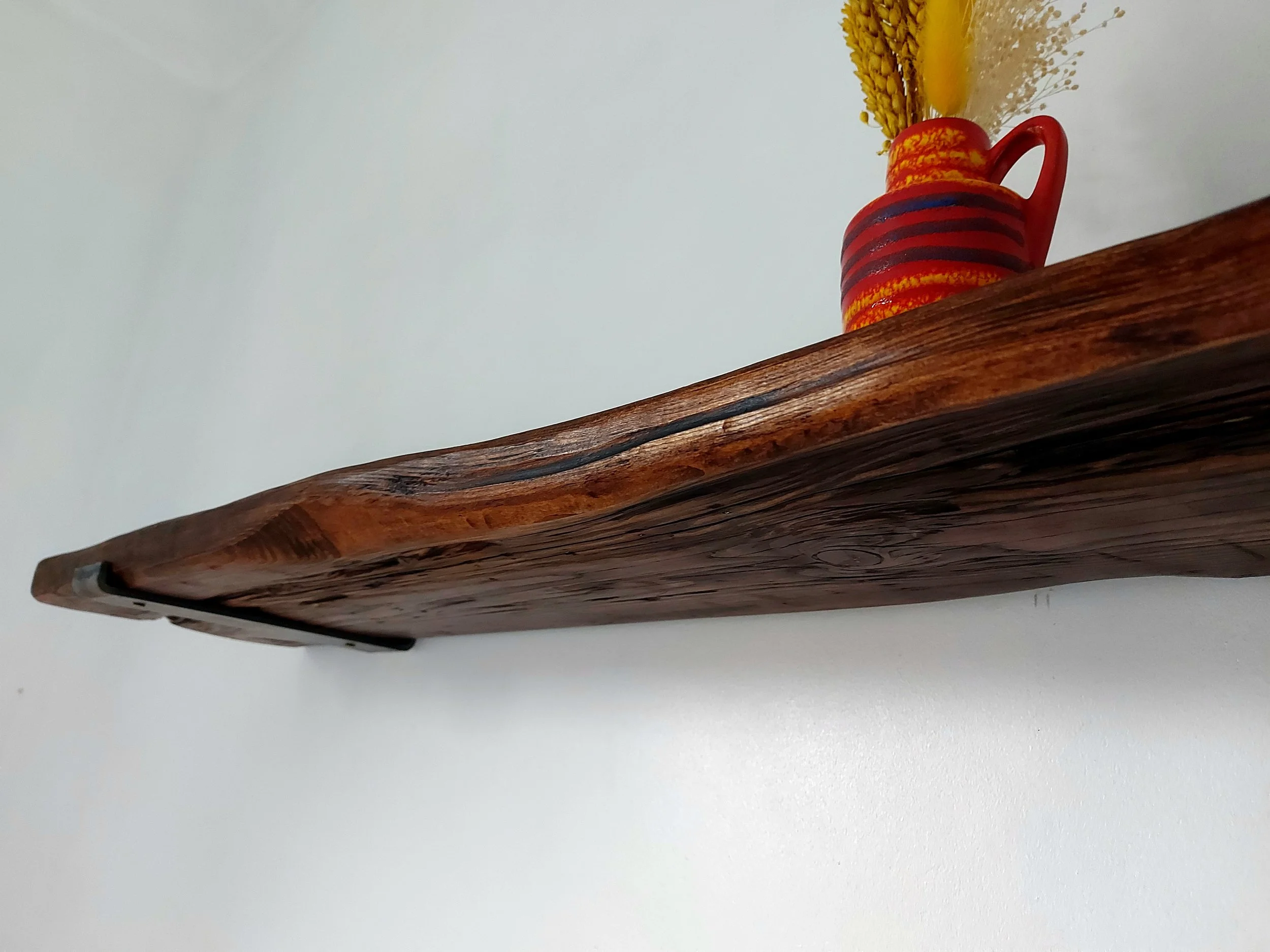 Close up of beautiful reclaimed wood shelf on white wall
Brown-Reclaimed-Sheffield-
Handmade-Bespoke-Shelving