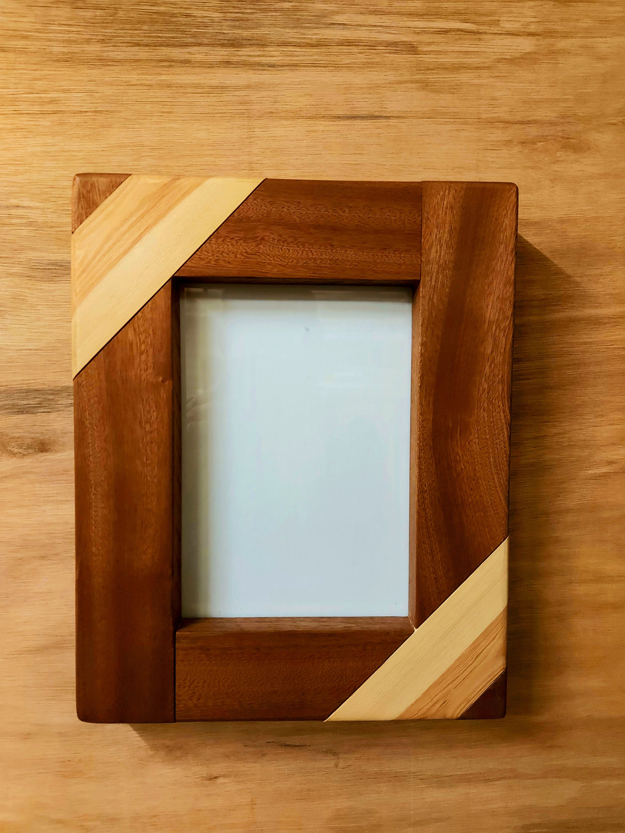 Handmade chunky picture frame, dark wood with light coloured diagonal inlays
Brown-Reclaimed-Sheffield-
Handmade-Bespoke-Frame- Reclaimed-Wood